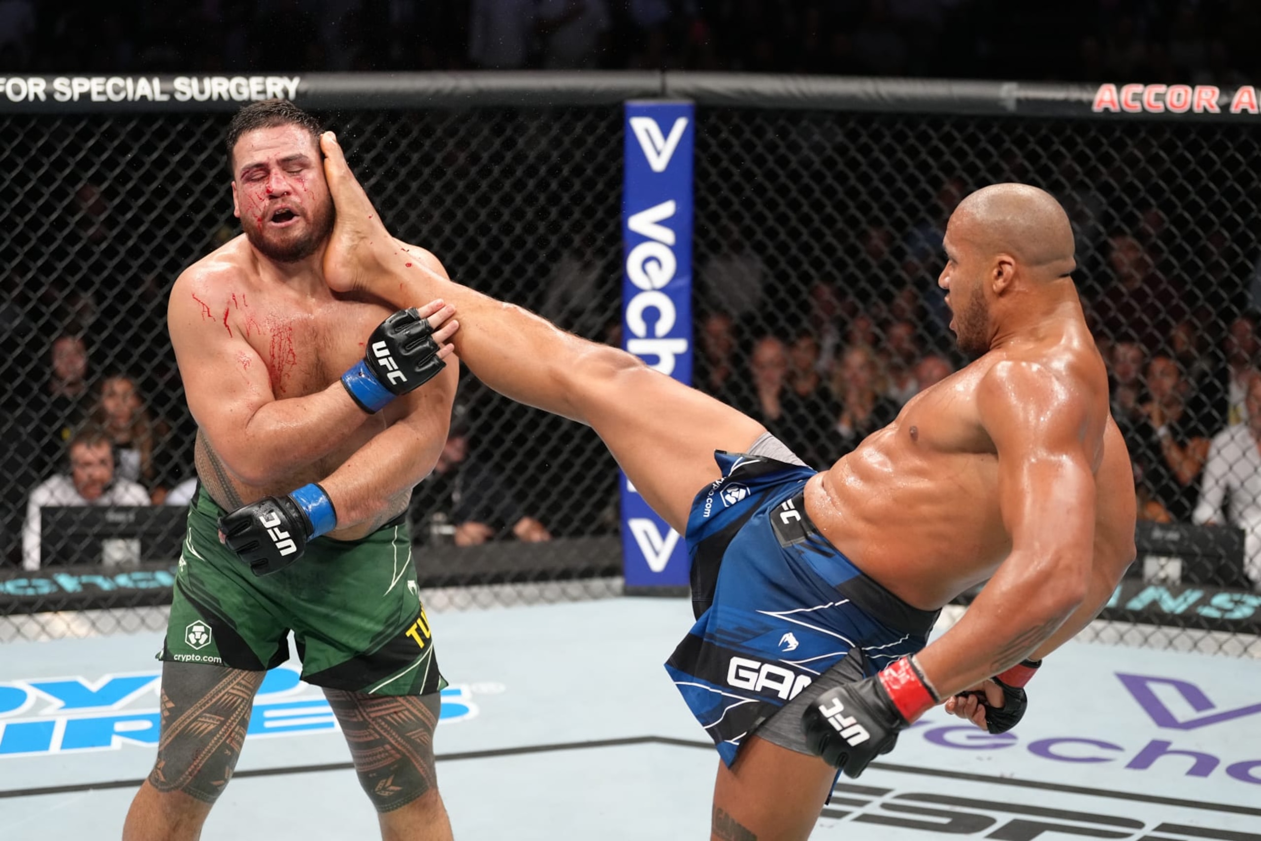 PARIS, FRANCE - SEPTEMBER 03: (R-L) Ciryl Gane of France kicks Tai Tuivasa of Australia in a heavyweight fight during the UFC Fight Night event at The Accor Arena on September 03, 2022 in Paris, France. (Photo by Jeff Bottari/Zuffa LLC)
