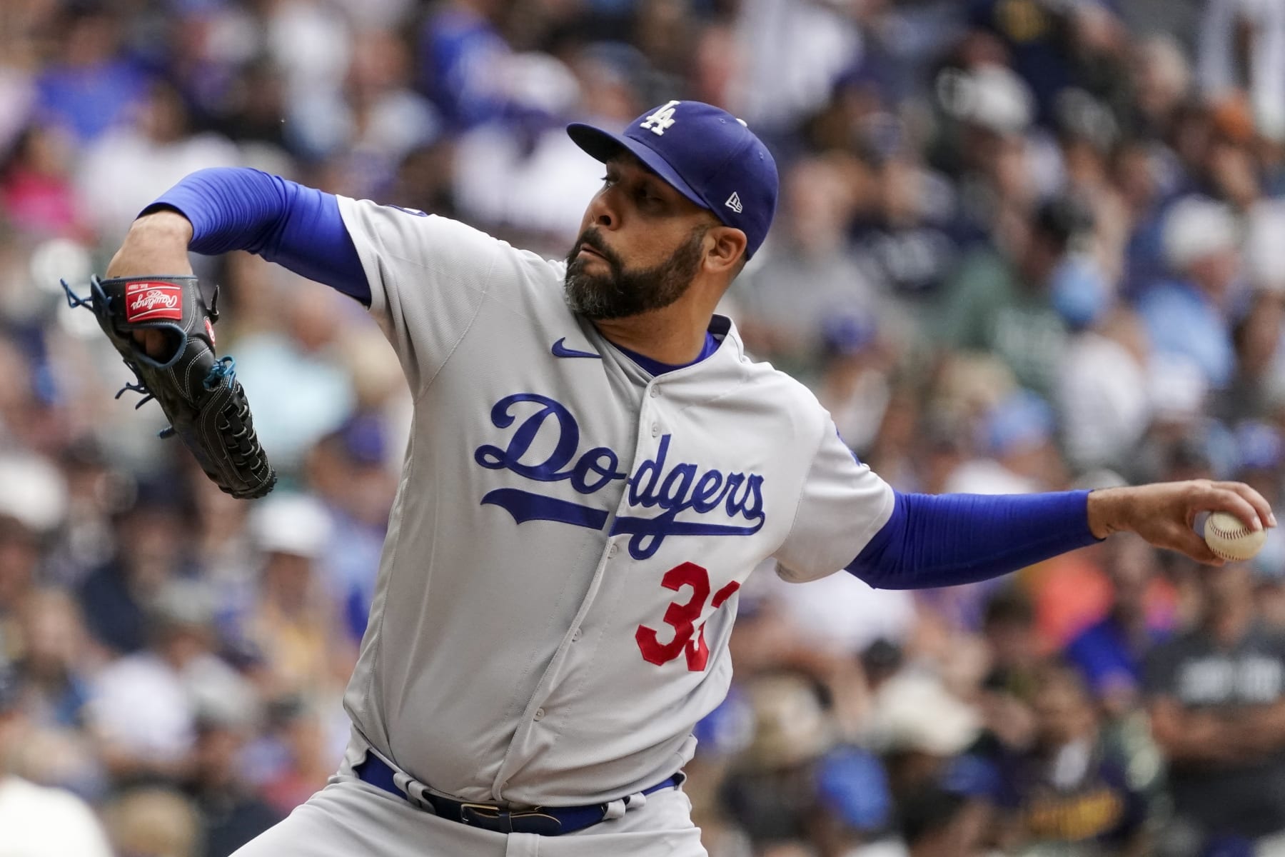 Los Angeles Dodgers' David Price throws during the sixth inning of a baseball game against the Milwaukee Brewers Thursday, Aug. 18, 2022, in Milwaukee. (AP Photo/Morry Gash)