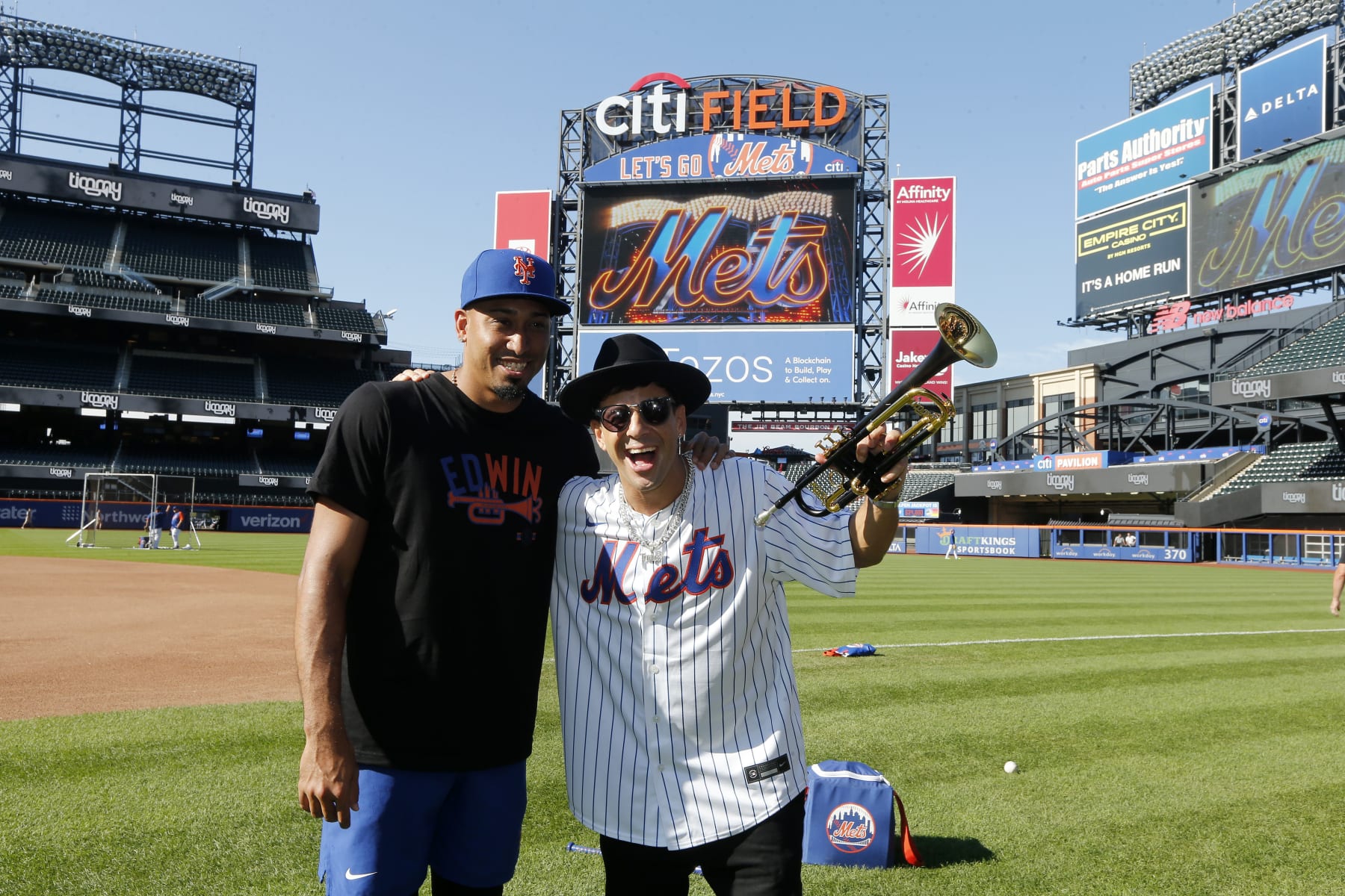 NEW YORK, NEW YORK - AUGUST 30:  Musician Timmy Trumpet and Edwin Diaz #39 of the New York Mets pose for a photograph before the Mets play the Los Angeles Dodgers at Citi Field on August 30, 2022 in New York City. The Dodgers defeated the Mets 4-3. Trumpet's song 'Narco' is used when Diaz enter a game. (Photo by McIsaac/Getty Images)