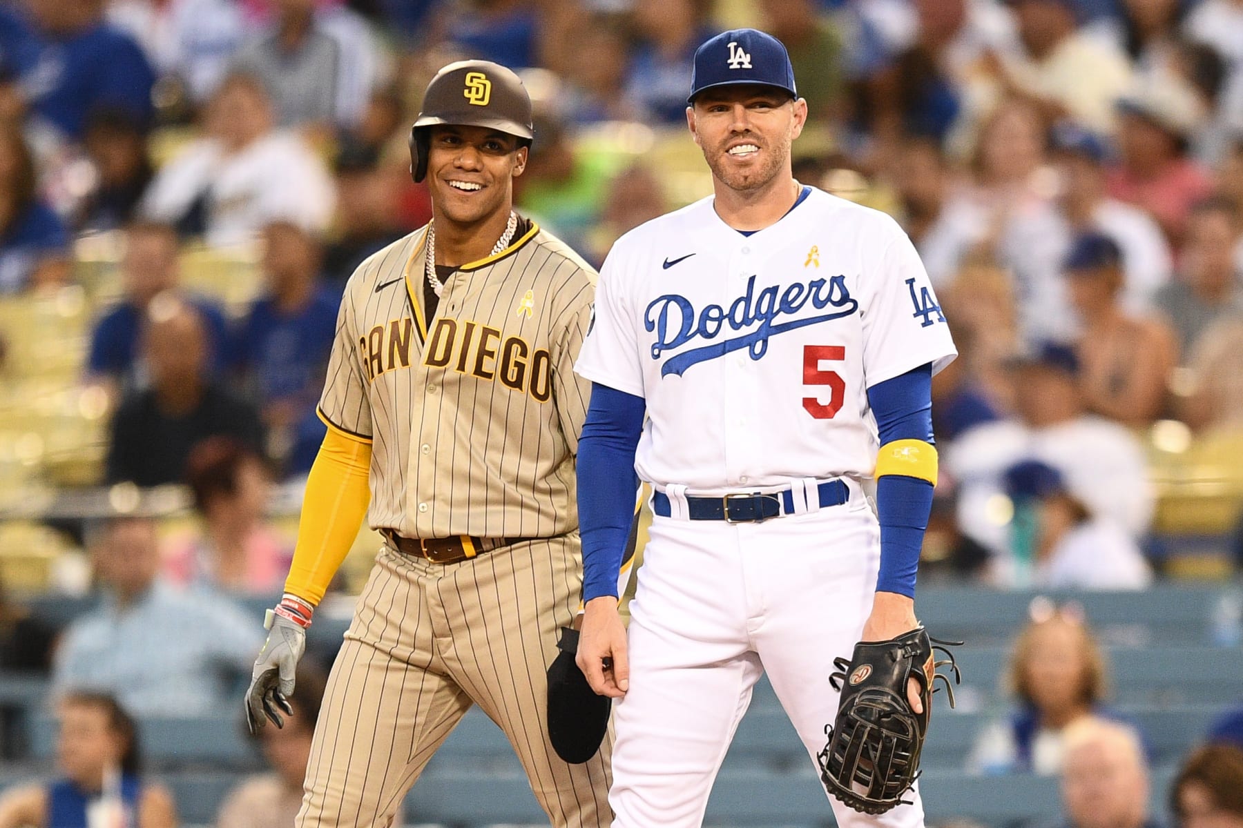 LOS ANGELES, CA - SEPTEMBER 02: San Diego Padres right fielder Juan Soto (22) jokes with Los Angeles Dodgers first baseman Freddie Freeman (5) during the MLB game between the San Diego Padres and the Los Angeles Dodgers on September 2, 2022 at Dodger Stadium in Los Angeles, CA. (Photo by Brian Rothmuller/Icon Sportswire via Getty Images)