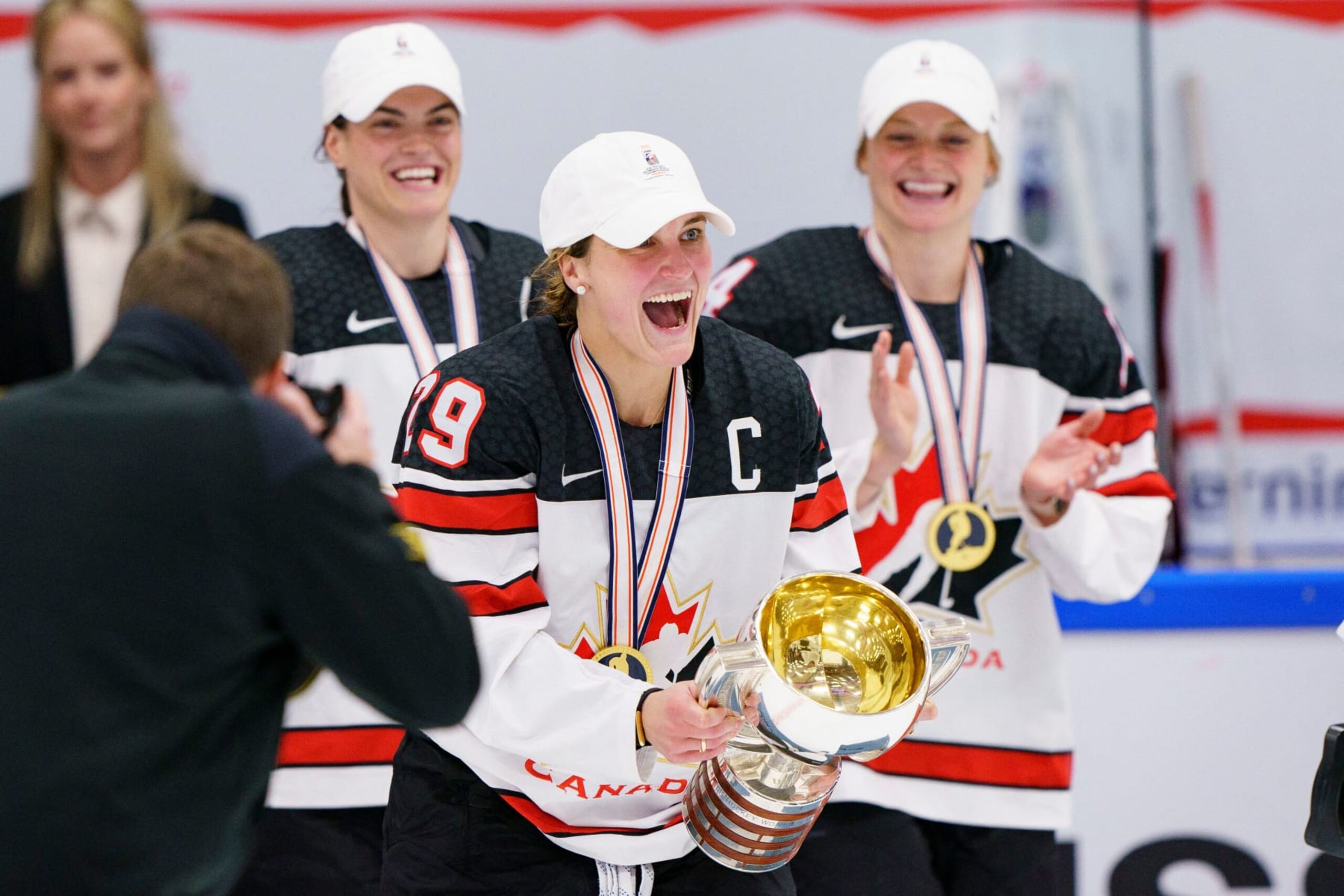 Marie-Philip Poulin of Canada celebrates with the trophy after winning the women's IIHF World Championship ice hockey gold medal match between USA and Canada in Herning, Denmark, on September 4, 2022. - Denmark OUT (Photo by Nicolas TUCAT / Ritzau Scanpix / AFP) / Denmark OUT (Photo by NICOLAS TUCAT/Ritzau Scanpix/AFP via Getty Images) Marie-Philip Poulin of Canada celebrates with the trophy after winning the women's IIHF World Championship ice hockey gold medal match between USA and Canada in Herning, Denmark, on September 4, 2022. - Denmark OUT (Photo by Nicolas TUCAT / Ritzau Scanpix / AFP) / Denmark OUT (Photo by NICOLAS TUCAT/Ritzau Scanpix/AFP via Getty Images)