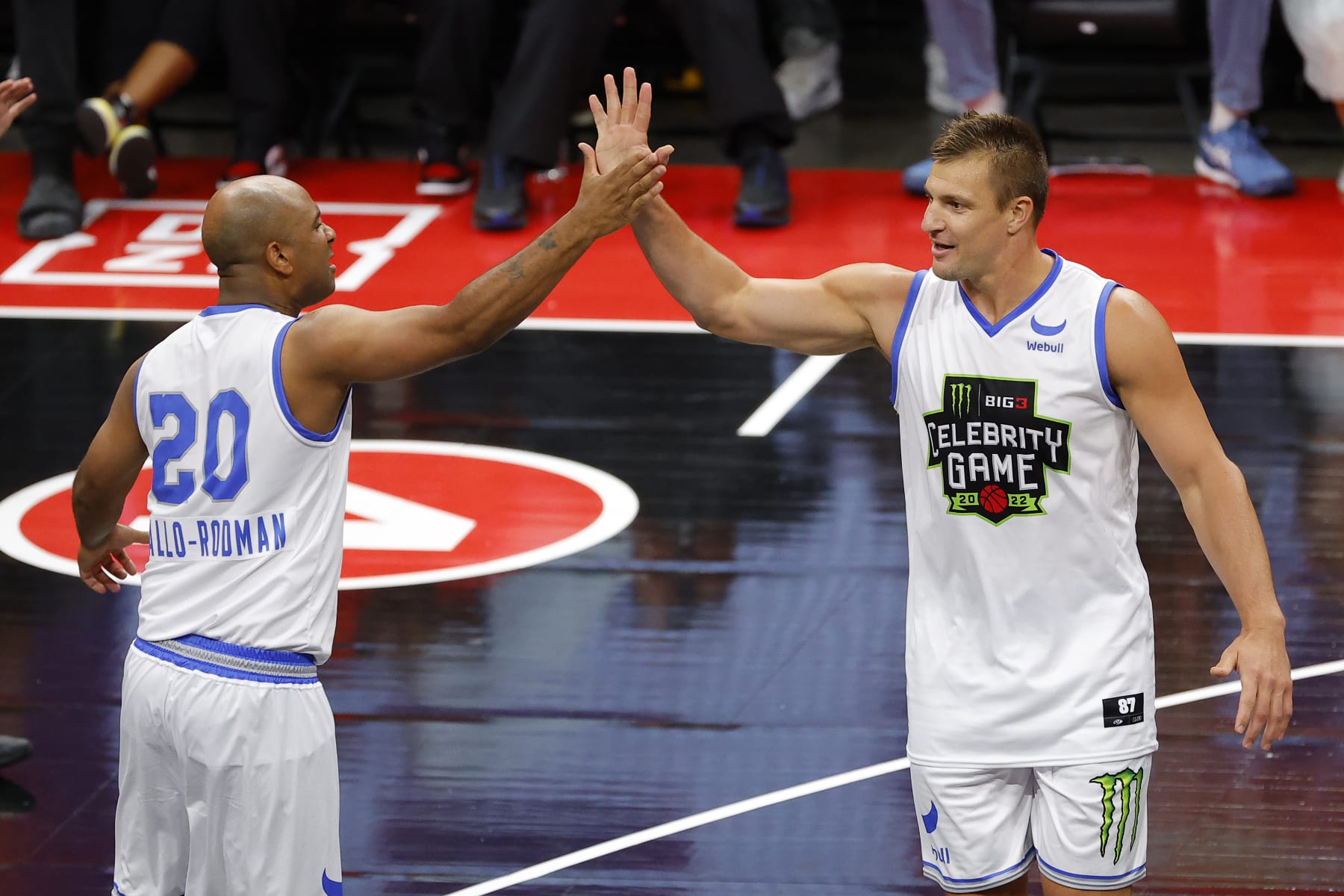 ATLANTA, GEORGIA - AUGUST 21: Rob Gronkowski celebrates with Wallo during the celebrity game prior to the BIG3 Championship at State Farm Arena on August 21, 2022 in Atlanta, Georgia. (Photo by Todd Kirkland/Getty Images for BIG3)