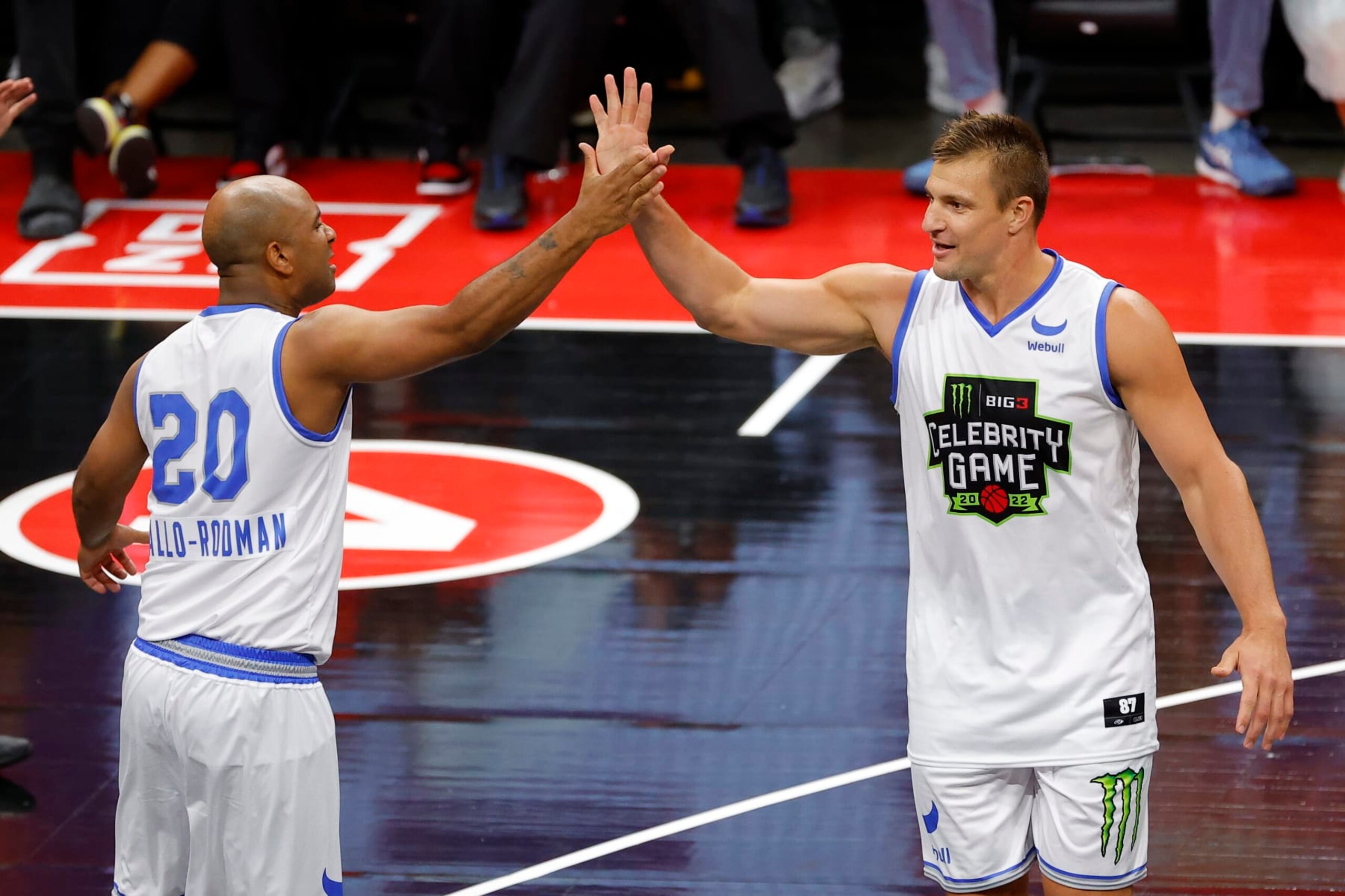 ATLANTA, GEORGIA - AUGUST 21: Rob Gronkowski celebrates with Wallo during the celebrity game prior to the BIG3 Championship at State Farm Arena on August 21, 2022 in Atlanta, Georgia. (Photo by Todd Kirkland/Getty Images for BIG3)