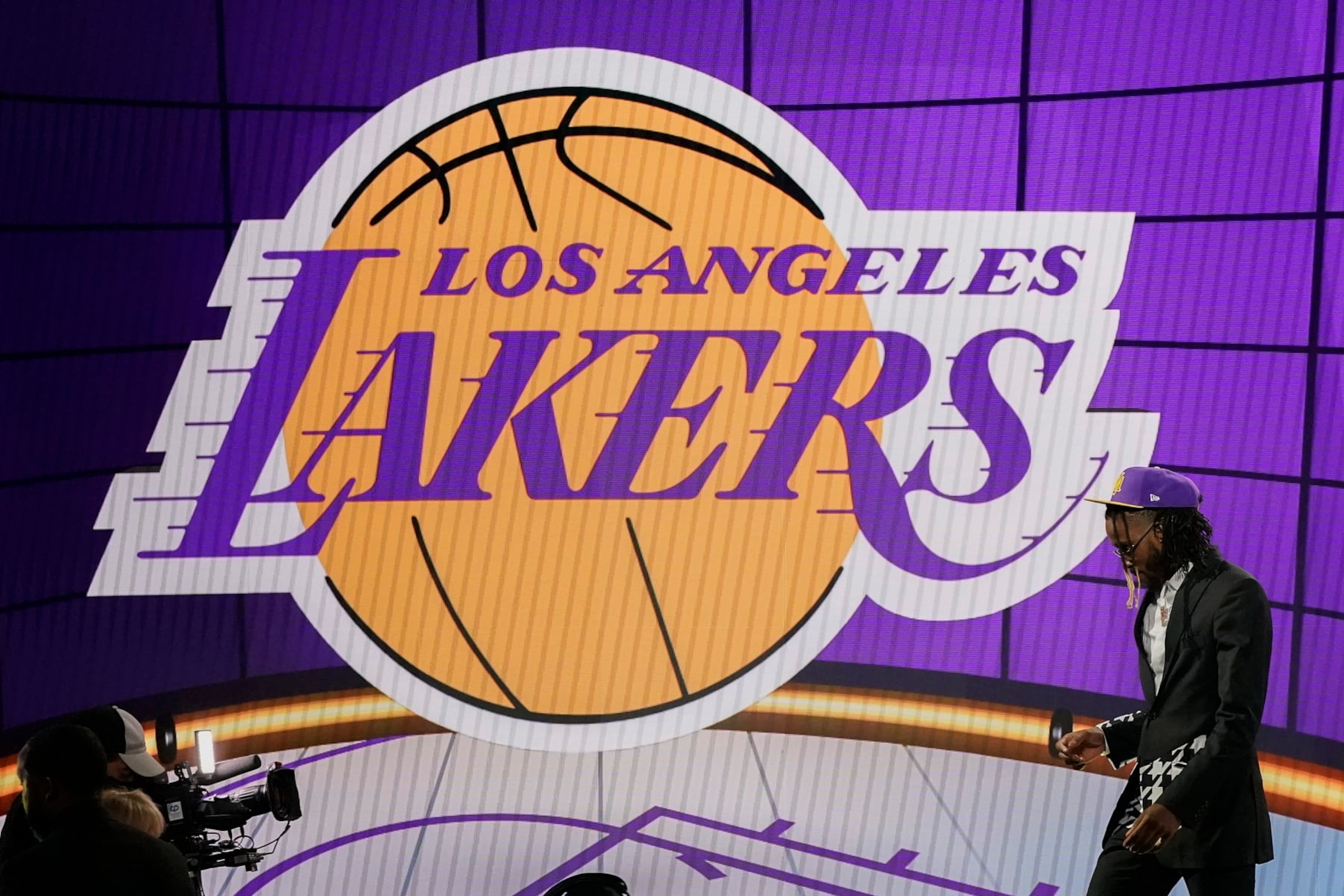 Isaiah Jackson walks off the stage after being selected 22nd overall by the Los Angeles Lakers during the NBA basketball draft, Thursday, July 29, 2021, in New York. (AP Photo/Corey Sipkin)
