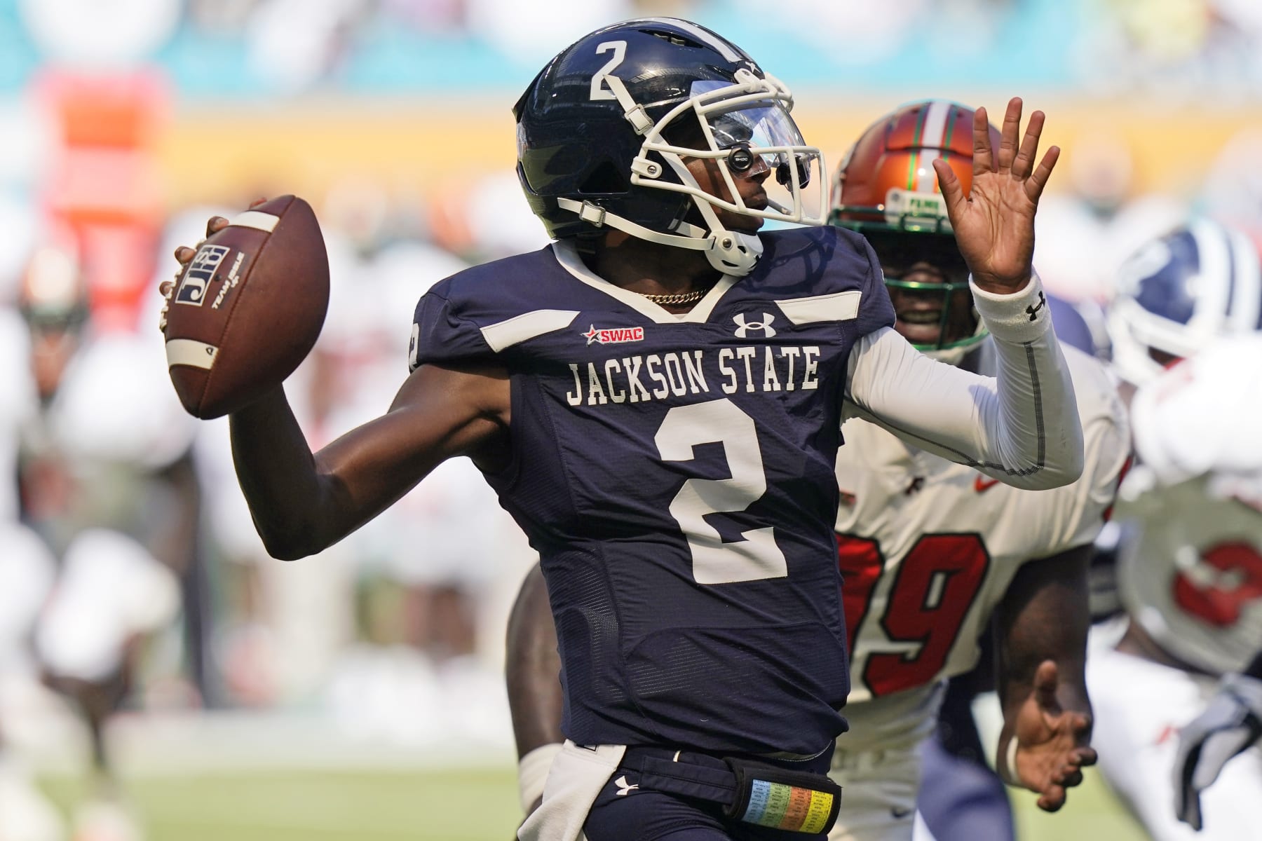 Jackson State quarterback Shedeur Sanders (2) stands back to pass during the first half of the Orange Blossom Classic NCAA college football game against Florida A&M, Sunday, Sept. 4, 2022, in Miami Gardens, Fla. (AP Photo/Lynne Sladky)