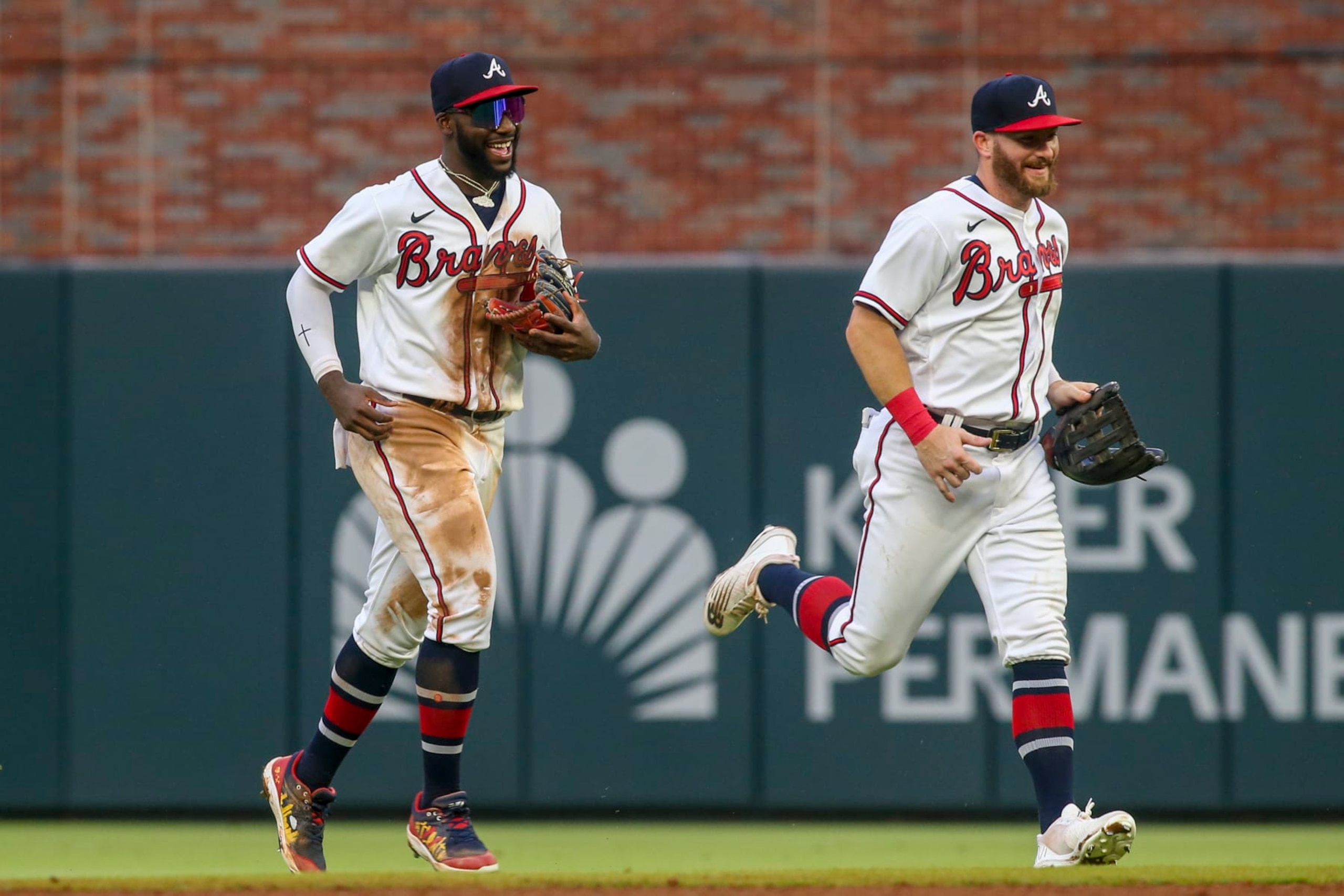 ATLANTA, GA - SEPTEMBER 04: Michael Harris II #23 and Robbie Grossman #15 of the Atlanta Braves celebrate after a victory against the Miami Marlins at Truist Park on September 4, 2022 in Atlanta, Georgia. (Photo by Brett Davis/Getty Images)