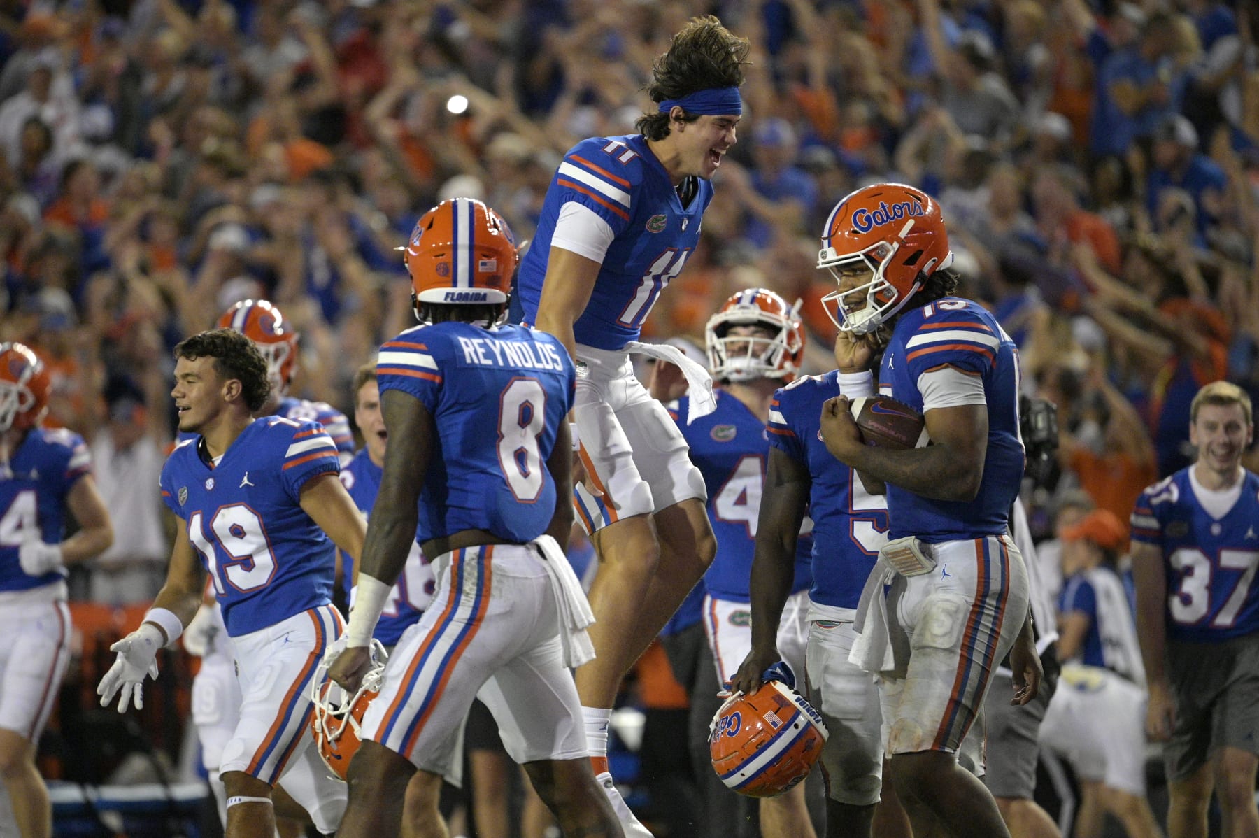 Florida quarterback Jalen Kitna (11) celebrates on the field after quarterback Anthony Richardson (15) took a knee for the final play of their win against Utah during an NCAA college football game, Saturday, Sept. 3, 2022, in Gainesville, Fla. (AP Photo/Phelan M. Ebenhack)