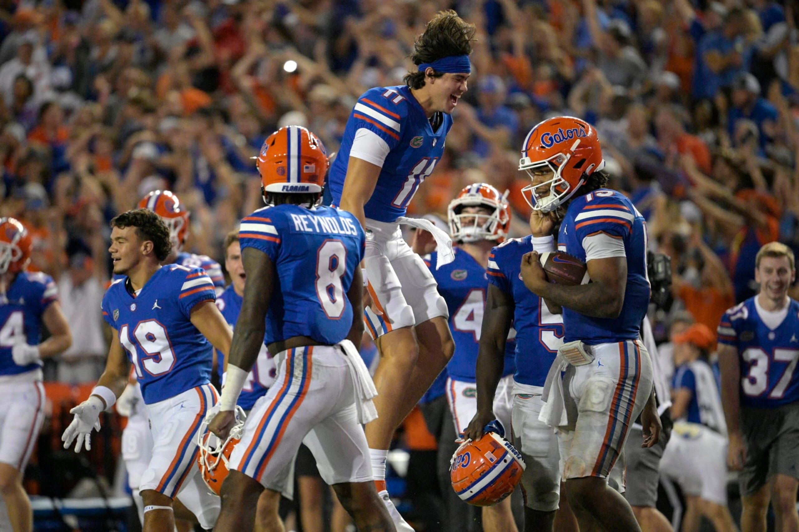Florida quarterback Jalen Kitna (11) celebrates on the field after quarterback Anthony Richardson (15) took a knee for the final play of their win against Utah during an NCAA college football game, Saturday, Sept. 3, 2022, in Gainesville, Fla. (AP Photo/Phelan M. Ebenhack)