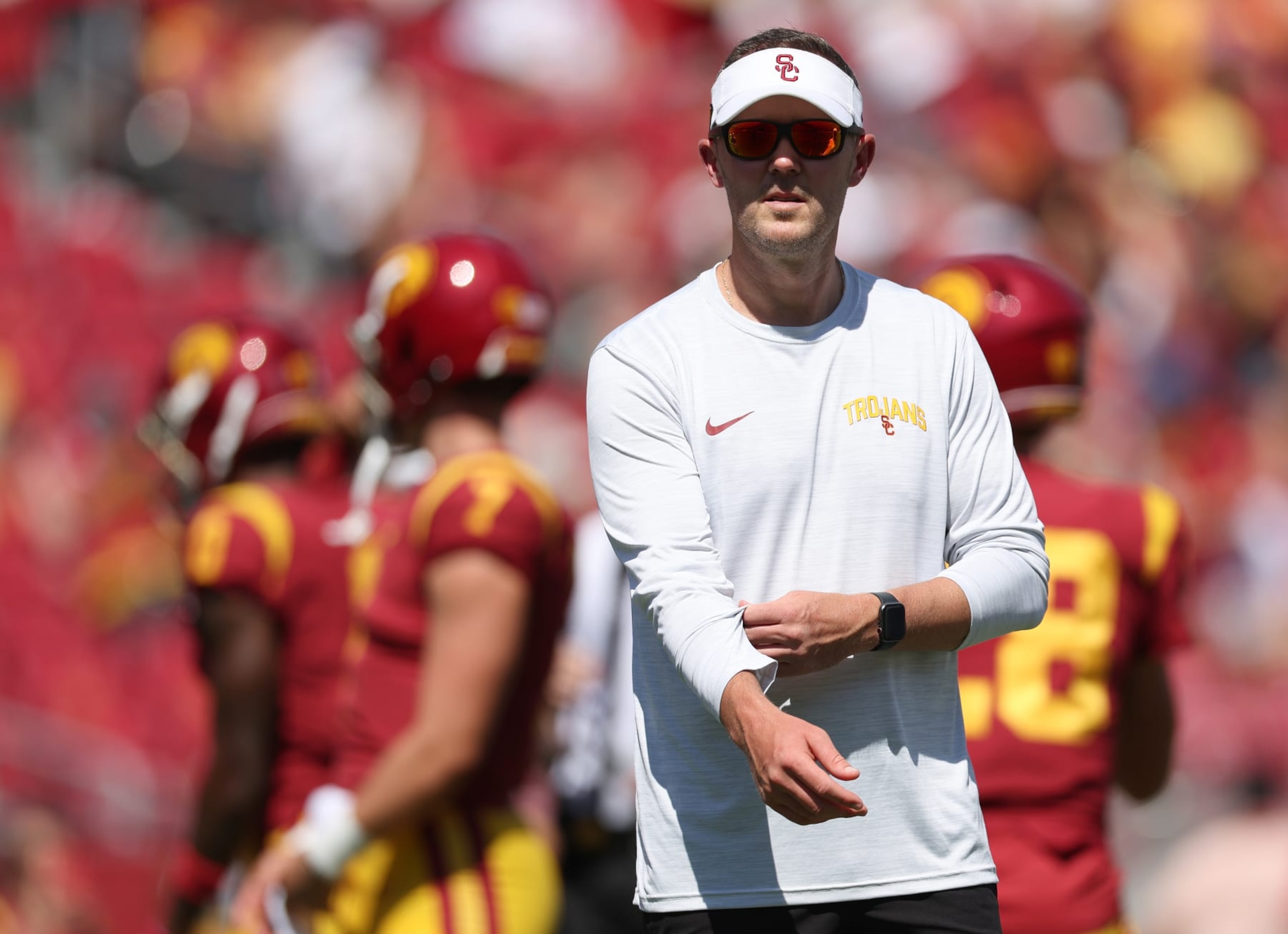 LOS ANGELES, CALIFORNIA - SEPTEMBER 03: Head coach Lincoln Riley of the USC Trojans looks on during warm up before the game against the Rice Owls at United Airlines Field at the Los Angeles Memorial Coliseum on September 03, 2022 in Los Angeles, California. (Photo by Harry How/Getty Images)