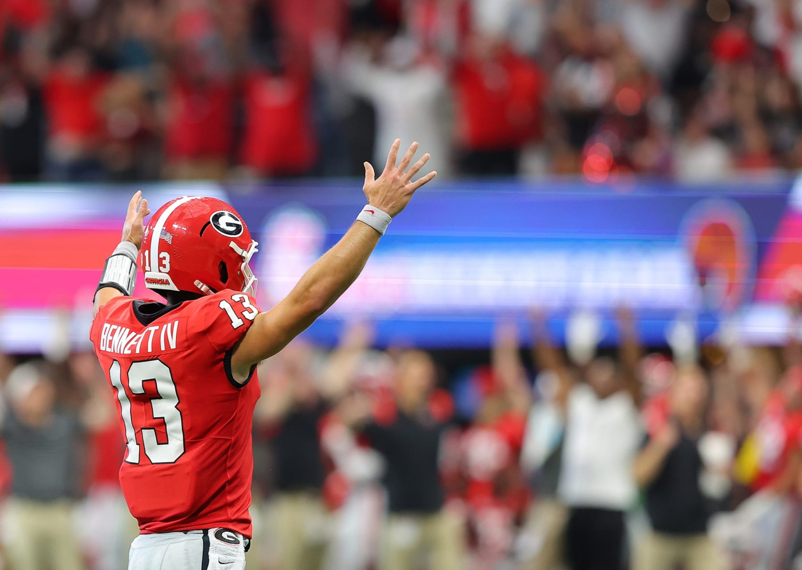 ATLANTA, GEORGIA - SEPTEMBER 03:  Stetson Bennett #13 of the Georgia Bulldogs reacts after their first touchdown against the Oregon Ducks during the first quarter of the Chick-fil-A Kick-Off Game between Oregon and Georgia at Mercedes-Benz Stadium on September 03, 2022 in Atlanta, Georgia. (Photo by Kevin C. Cox/Getty Images)