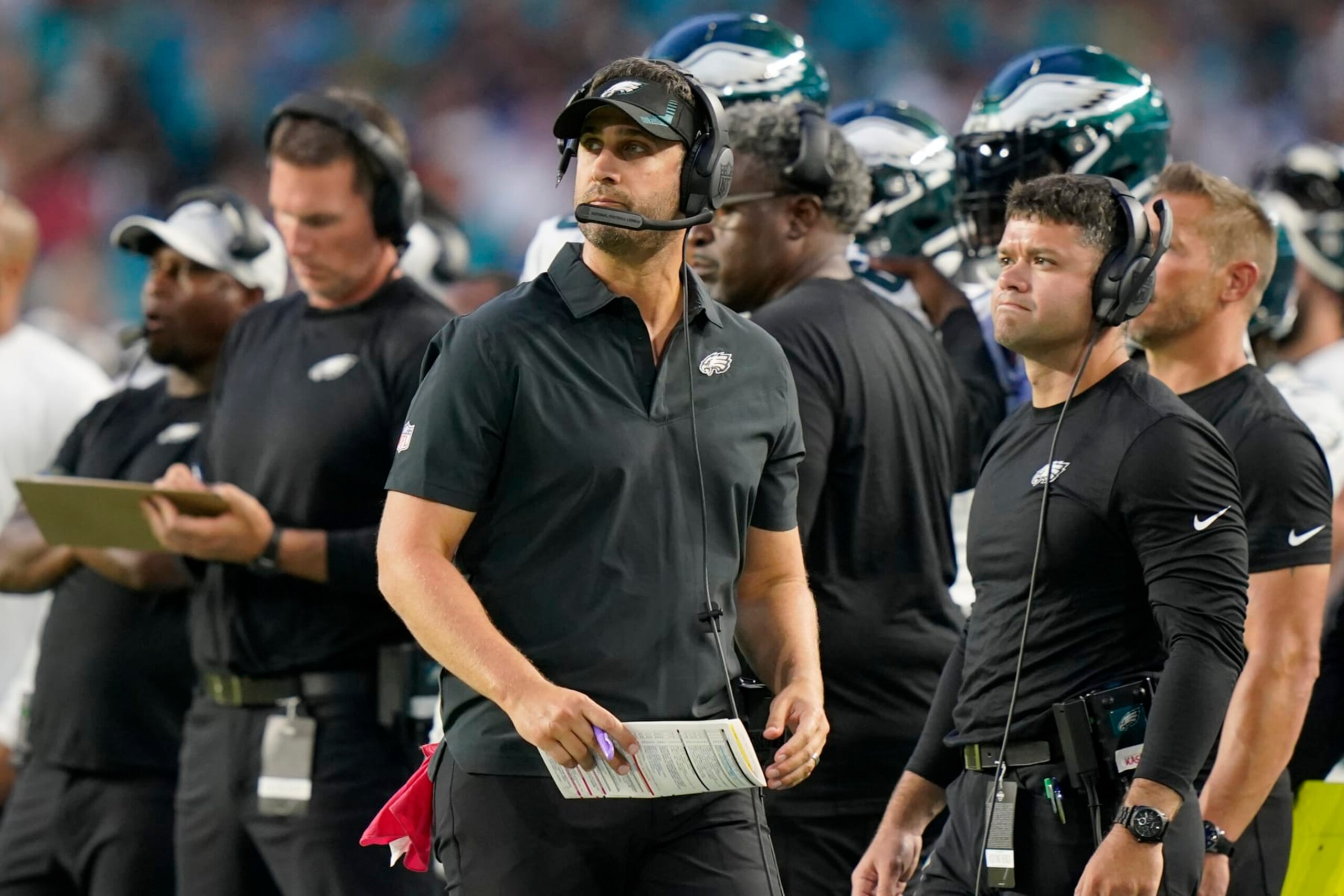Philadelphia Eagles head coach Nick Sirianni, center, walks along the sideline during the first half of a NFL preseason football game, Saturday, Aug. 27, 2022, in Miami Gardens, Fla. (AP Photo/Lynne Sladky)