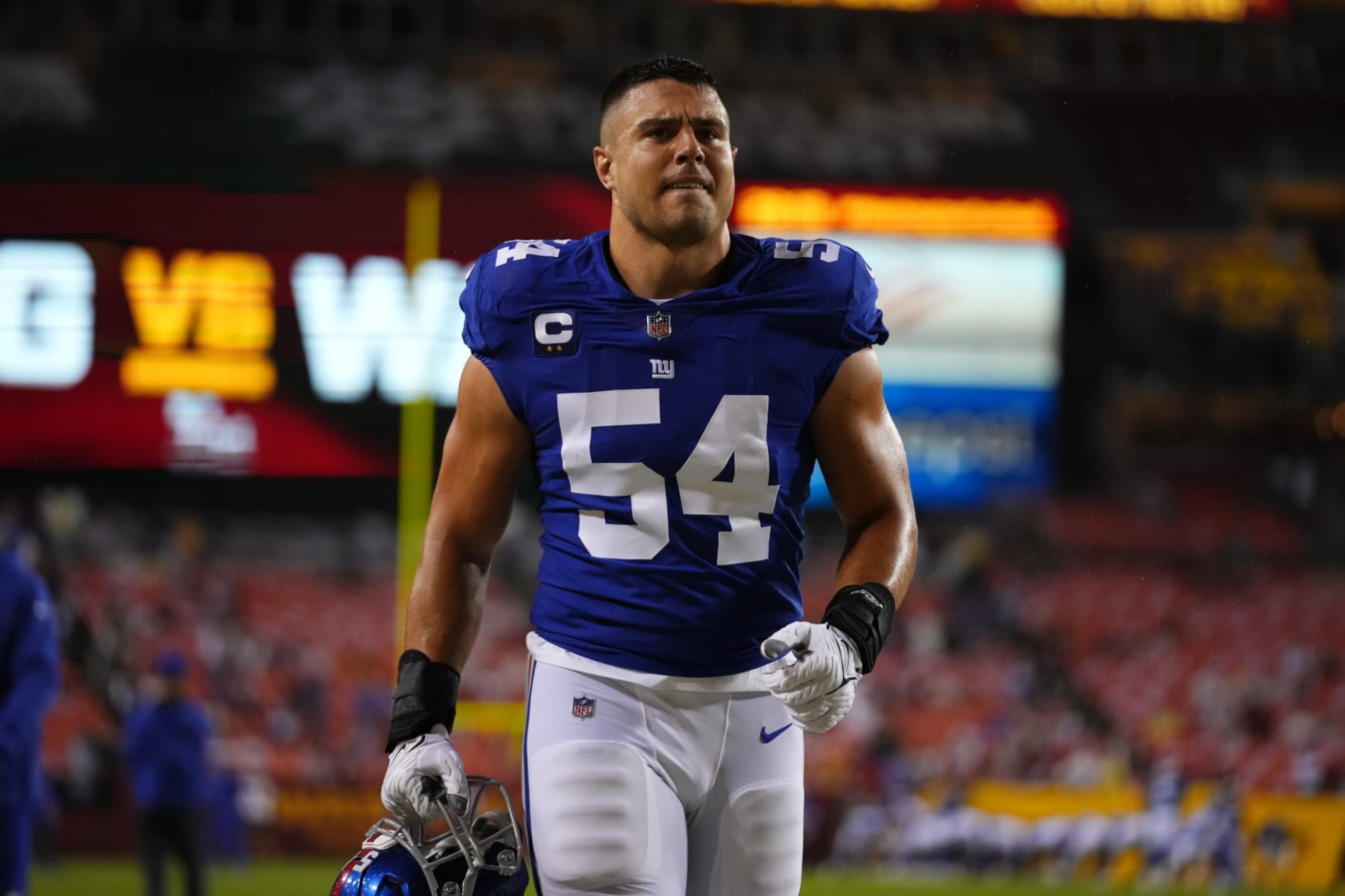 LANDOVER, MARYLAND - SEPTEMBER 16: Blake Martinez #54 of the New York Giants walks onto the field against the Washington Football Team prior to an NFL game at FedExField on September 16, 2021 in Landover, Maryland. (Photo by Cooper Neill/Getty Images)