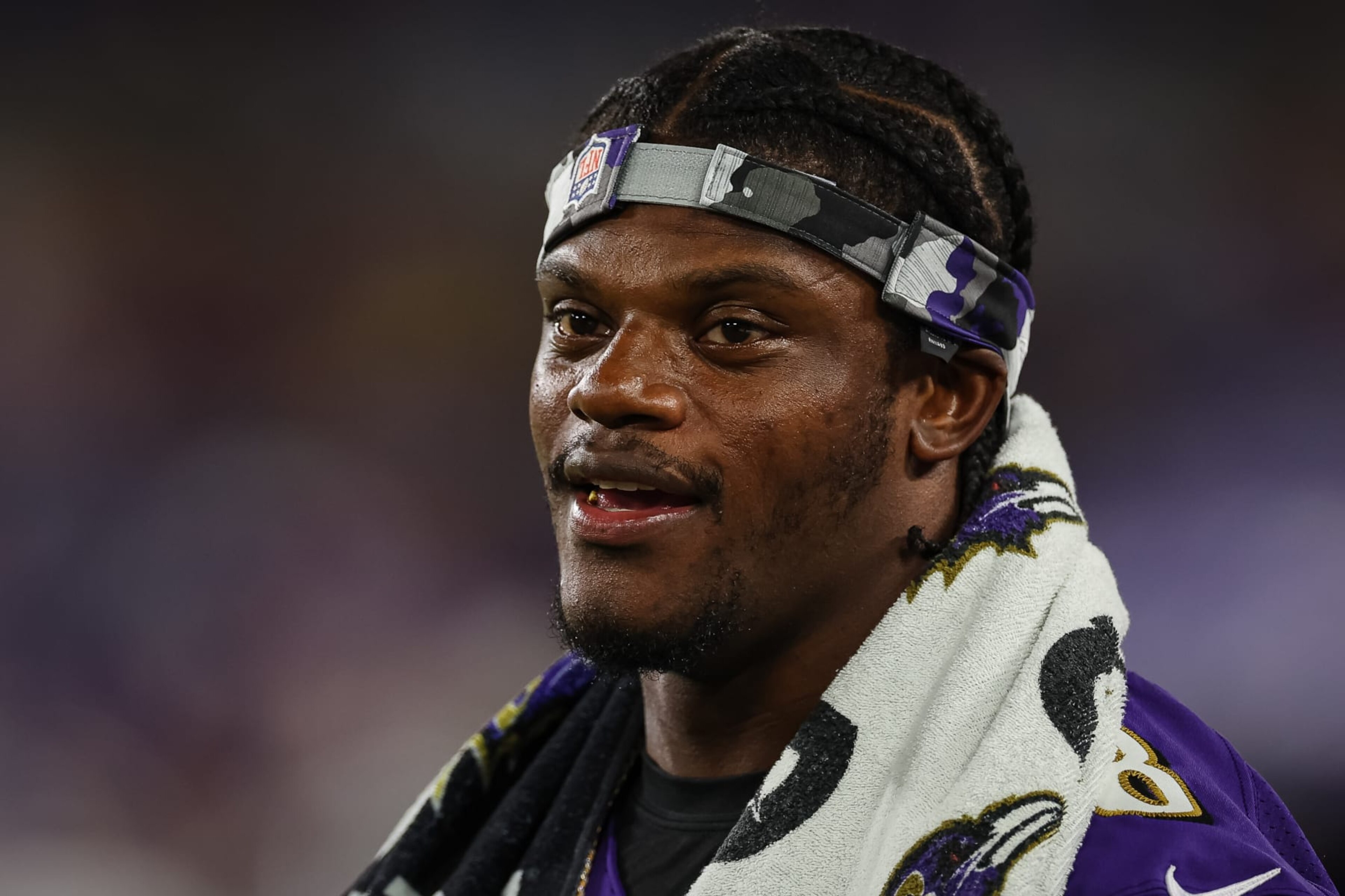 BALTIMORE, MD - AUGUST 11: Lamar Jackson #8 of the Baltimore Ravens looks on from the sidelines during the second half against the Tennessee Titans at M&T Bank Stadium on August 11, 2022 in Baltimore, Maryland. (Photo by Scott Taetsch/Getty Images) BALTIMORE, MD - AUGUST 11: Lamar Jackson #8 of the Baltimore Ravens looks on from the sidelines during the second half against the Tennessee Titans at M&T Bank Stadium on August 11, 2022 in Baltimore, Maryland. (Photo by Scott Taetsch/Getty Images)