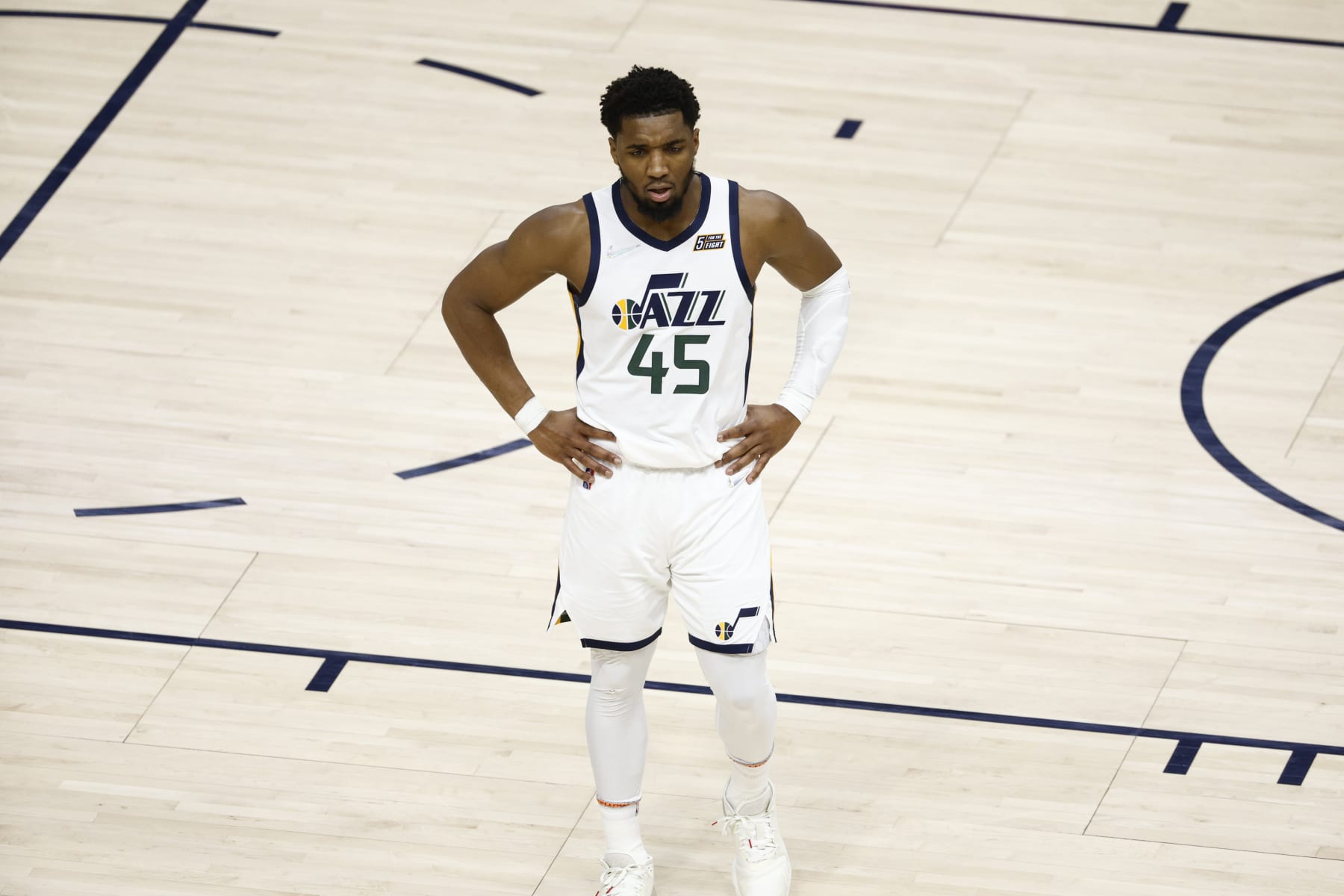 SALT LAKE CITY, UT - APRIL 23: Donovan Mitchell #45 of the Utah Jazz looks on during the game against the Dallas Mavericks during Round 1 Game 4 of the 2022 NBA Playoffs on April 23, 2022 at Vivint SmartHome Arena in Salt Lake City, Utah. NOTE TO USER: User expressly acknowledges and agrees that, by downloading and or using this Photograph, User is consenting to the terms and conditions of the Getty Images License Agreement. Mandatory Copyright Notice: Copyright 2022 NBAE (Photo by Jeff Swinger/NBAE via Getty Images)