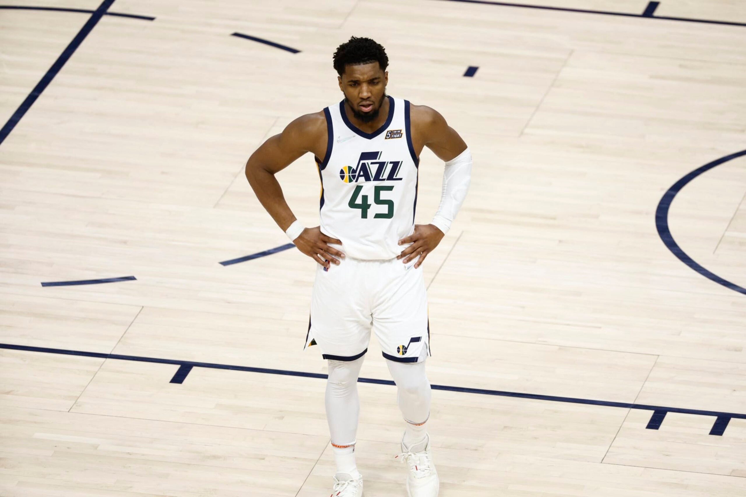 SALT LAKE CITY, UT - APRIL 23: Donovan Mitchell #45 of the Utah Jazz looks on during the game against the Dallas Mavericks during Round 1 Game 4 of the 2022 NBA Playoffs on April 23, 2022 at Vivint SmartHome Arena in Salt Lake City, Utah. NOTE TO USER: User expressly acknowledges and agrees that, by downloading and or using this Photograph, User is consenting to the terms and conditions of the Getty Images License Agreement. Mandatory Copyright Notice: Copyright 2022 NBAE (Photo by Jeff Swinger/NBAE via Getty Images)