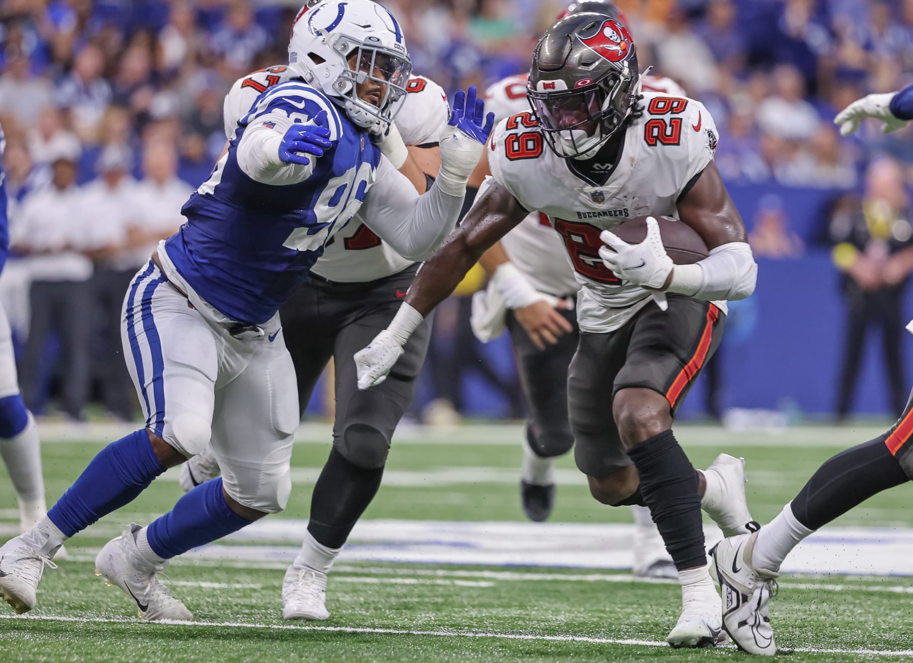 INDIANAPOLIS, IN - AUGUST 27: Rachaad White #29 of Tampa Bay Buccaneers runs the ball during the preseason game against the Indianapolis Colts at Lucas Oil Stadium on August 27, 2022 in Indianapolis, Indiana. (Photo by Michael Hickey/Getty Images)