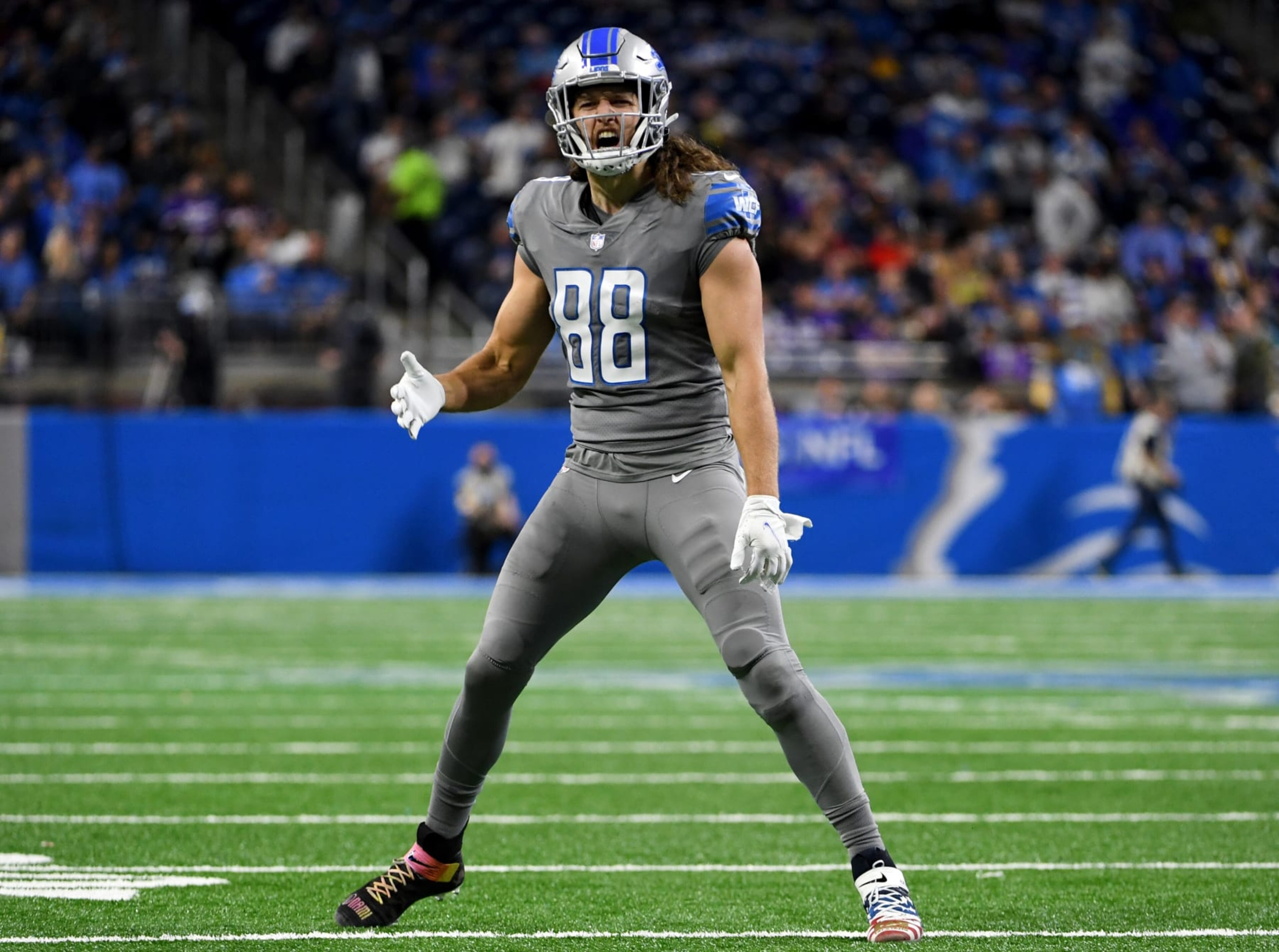 DETROIT, MICHIGAN - DECEMBER 05: T.J. Hockenson #88 of the Detroit Lions celebrates after scoring a touchdown during the second quarter against the Minnesota Vikings at Ford Field on December 05, 2021 in Detroit, Michigan. (Photo by Nic Antaya/Getty Images) DETROIT, MICHIGAN - DECEMBER 05: T.J. Hockenson #88 of the Detroit Lions celebrates after scoring a touchdown during the second quarter against the Minnesota Vikings at Ford Field on December 05, 2021 in Detroit, Michigan. (Photo by Nic Antaya/Getty Images)