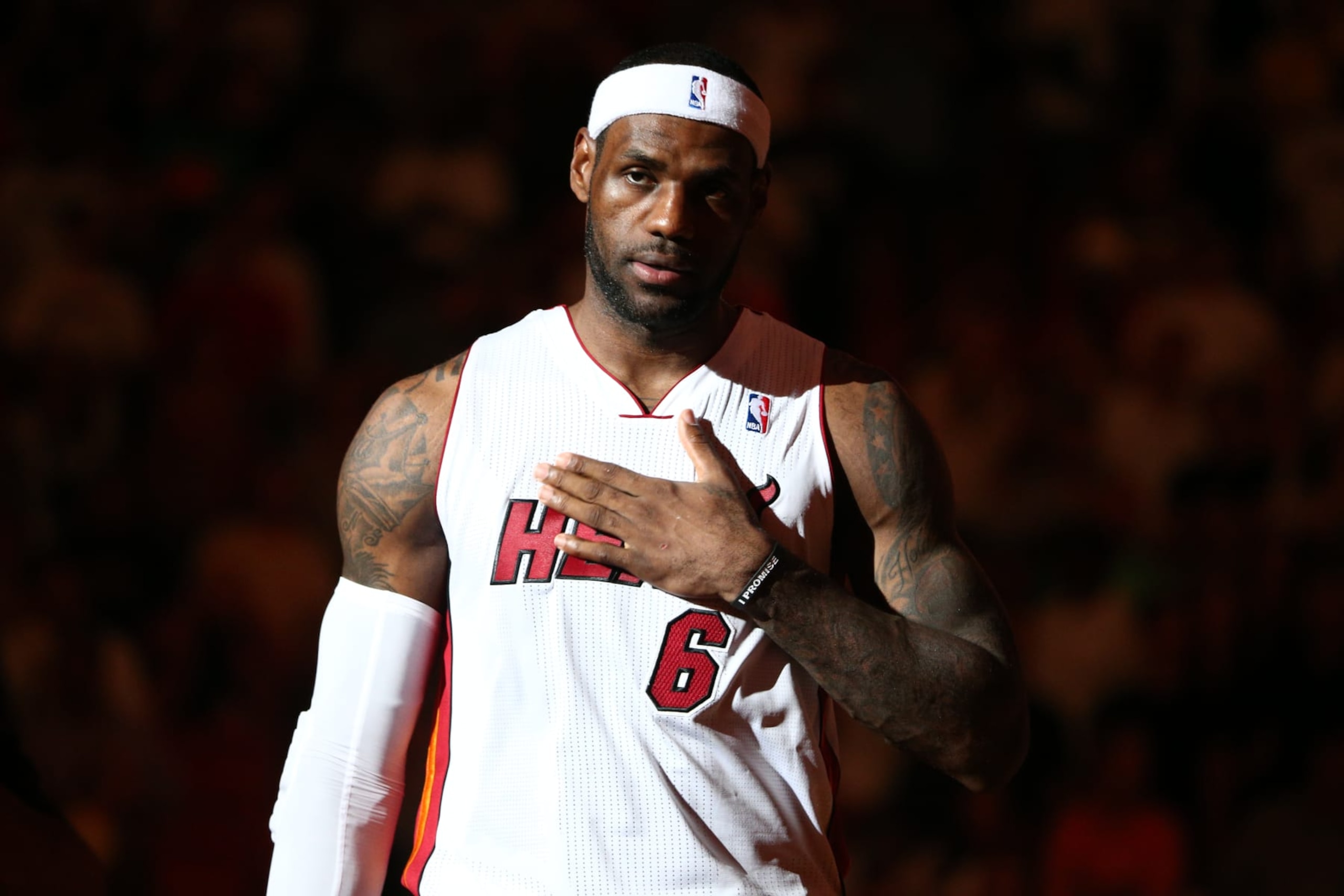 MIAMI, FL - APRIL 8: LeBron James #6 of the Miami Heat looks on against the Brooklyn Nets during game on April 8, 2014 at American Airlines Arena in Miami, Florida. NOTE TO USER: User expressly acknowledges and agrees that, by downloading and or using this photograph, User is consenting to the terms and conditions of the Getty Images License Agreement. Mandatory Copyright Notice: Copyright 2013 NBAE (Photo by Nathaniel S. Butler/NBAE via Getty Images) MIAMI, FL - APRIL 8: LeBron James #6 of the Miami Heat looks on against the Brooklyn Nets during game on April 8, 2014 at American Airlines Arena in Miami, Florida. NOTE TO USER: User expressly acknowledges and agrees that, by downloading and or using this photograph, User is consenting to the terms and conditions of the Getty Images License Agreement. Mandatory Copyright Notice: Copyright 2013 NBAE (Photo by Nathaniel S. Butler/NBAE via Getty Images)