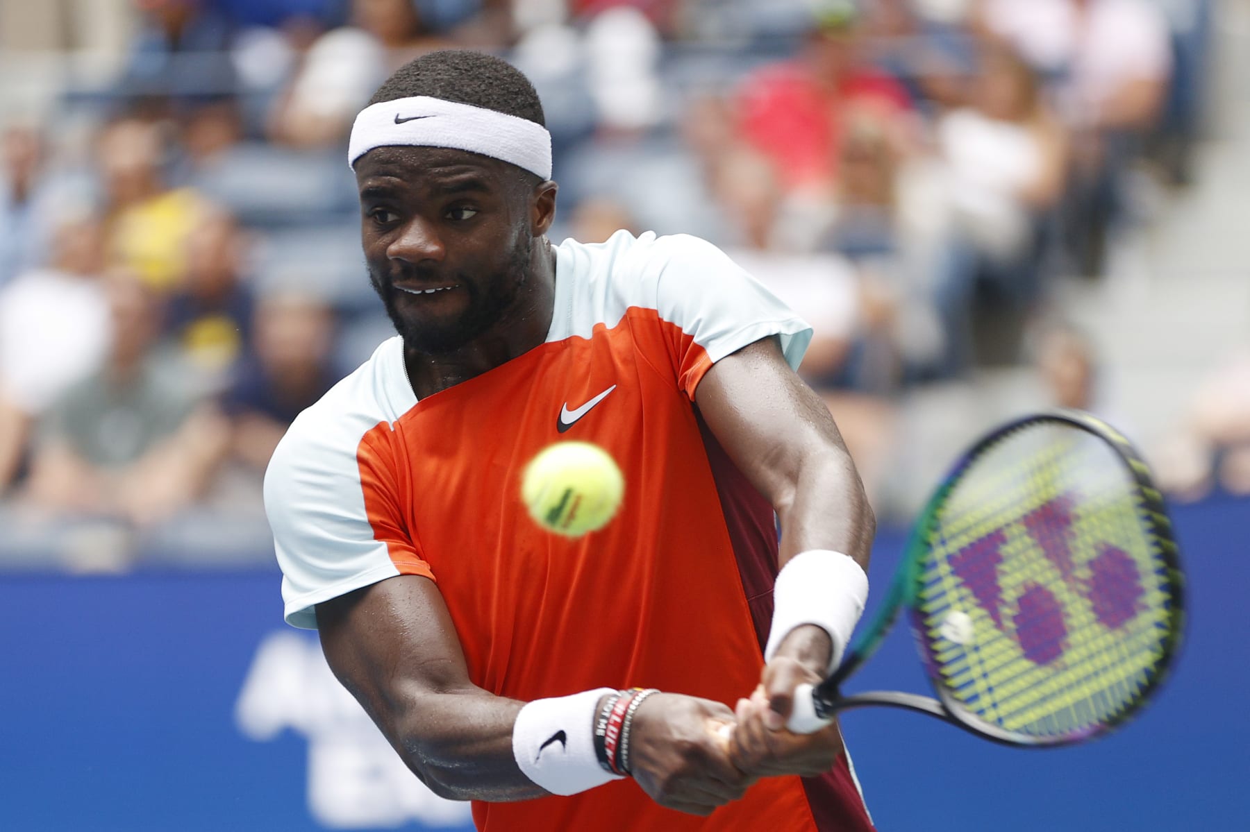 NEW YORK, NEW YORK - SEPTEMBER 05: Frances Tiafoe of the United States plays a backhand against Rafael Nadal of Spain during their Men’s Singles Fourth Round match on Day Eight of the 2022 US Open at USTA Billie Jean King National Tennis Center on September 05, 2022 in the Flushing neighborhood of the Queens borough of New York City. (Photo by Sarah Stier/Getty Images)