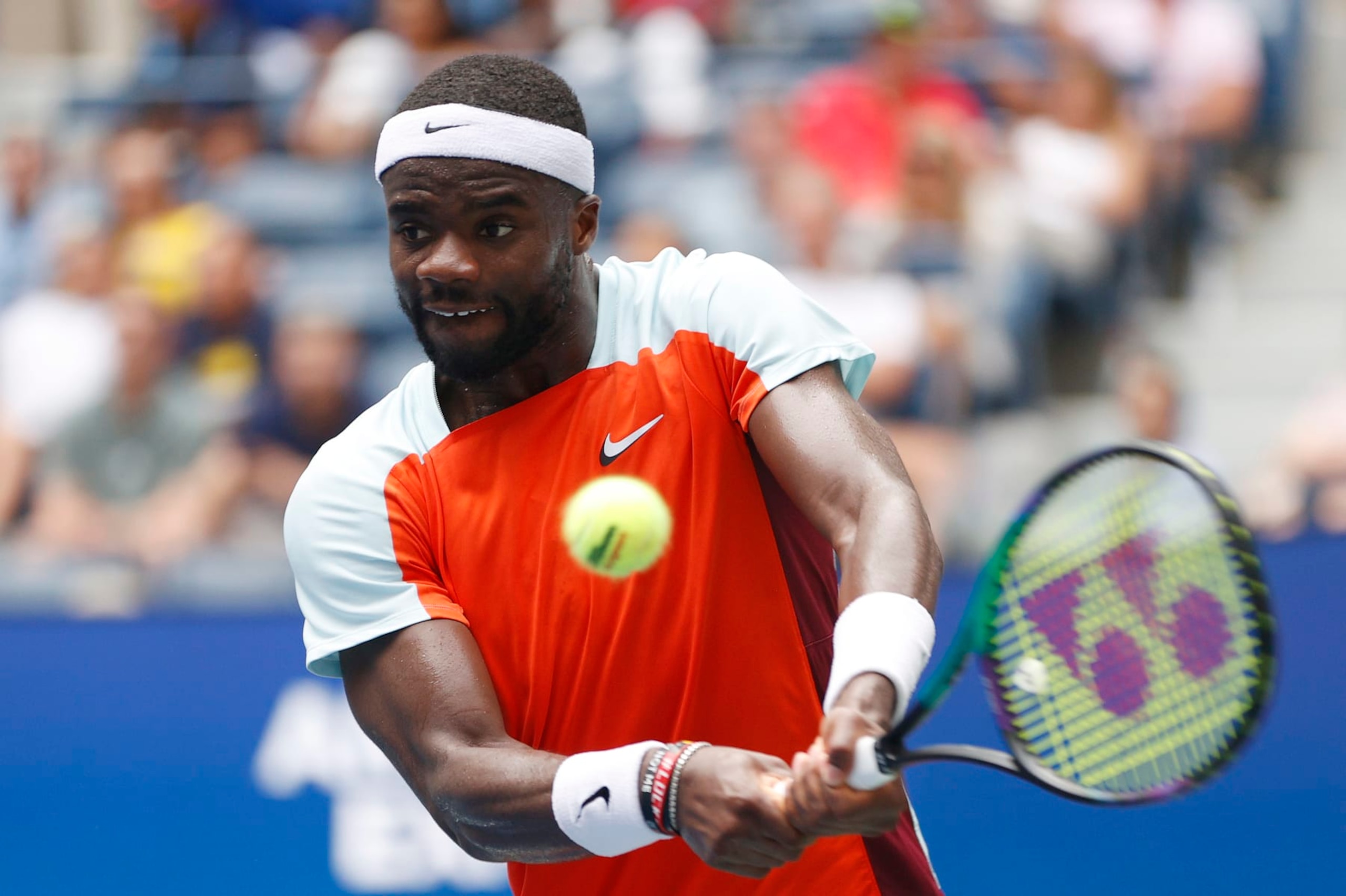 NEW YORK, NEW YORK - SEPTEMBER 05: Frances Tiafoe of the United States plays a backhand against Rafael Nadal of Spain during their Men’s Singles Fourth Round match on Day Eight of the 2022 US Open at USTA Billie Jean King National Tennis Center on September 05, 2022 in the Flushing neighborhood of the Queens borough of New York City. (Photo by Sarah Stier/Getty Images)