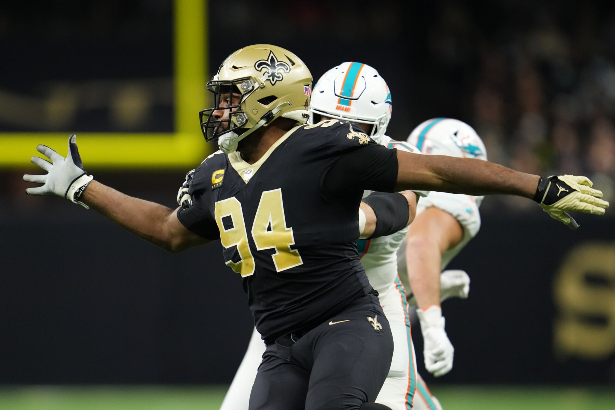 NEW ORLEANS, LOUISIANA - DECEMBER 27: Cameron Jordan #94 of the New Orleans Saints defends during an NFL game against theMiami Dolphins at Caesars Superdome on December 27, 2021 in New Orleans, Louisiana. (Photo by Cooper Neill/Getty Images)