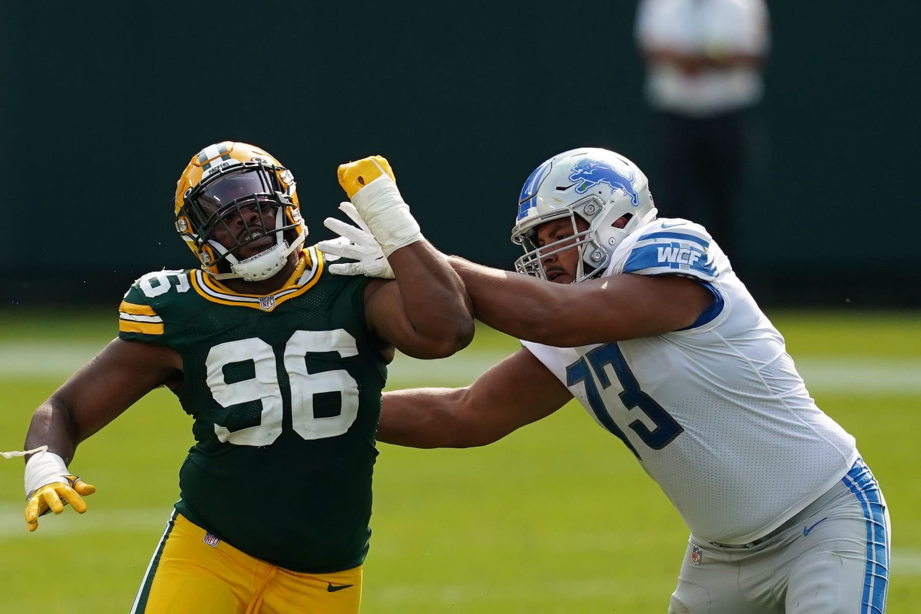 GREEN BAY, WISCONSIN - SEPTEMBER 20:  Kingsley Keke #96 of the Green Bay Packers works against Jonah Jackson #73 of the Detroit Lions during a game at Lambeau Field on September 20, 2020 in Green Bay, Wisconsin. The Packers defeated the Lions 42-21. (Photo by Stacy Revere/Getty Images)