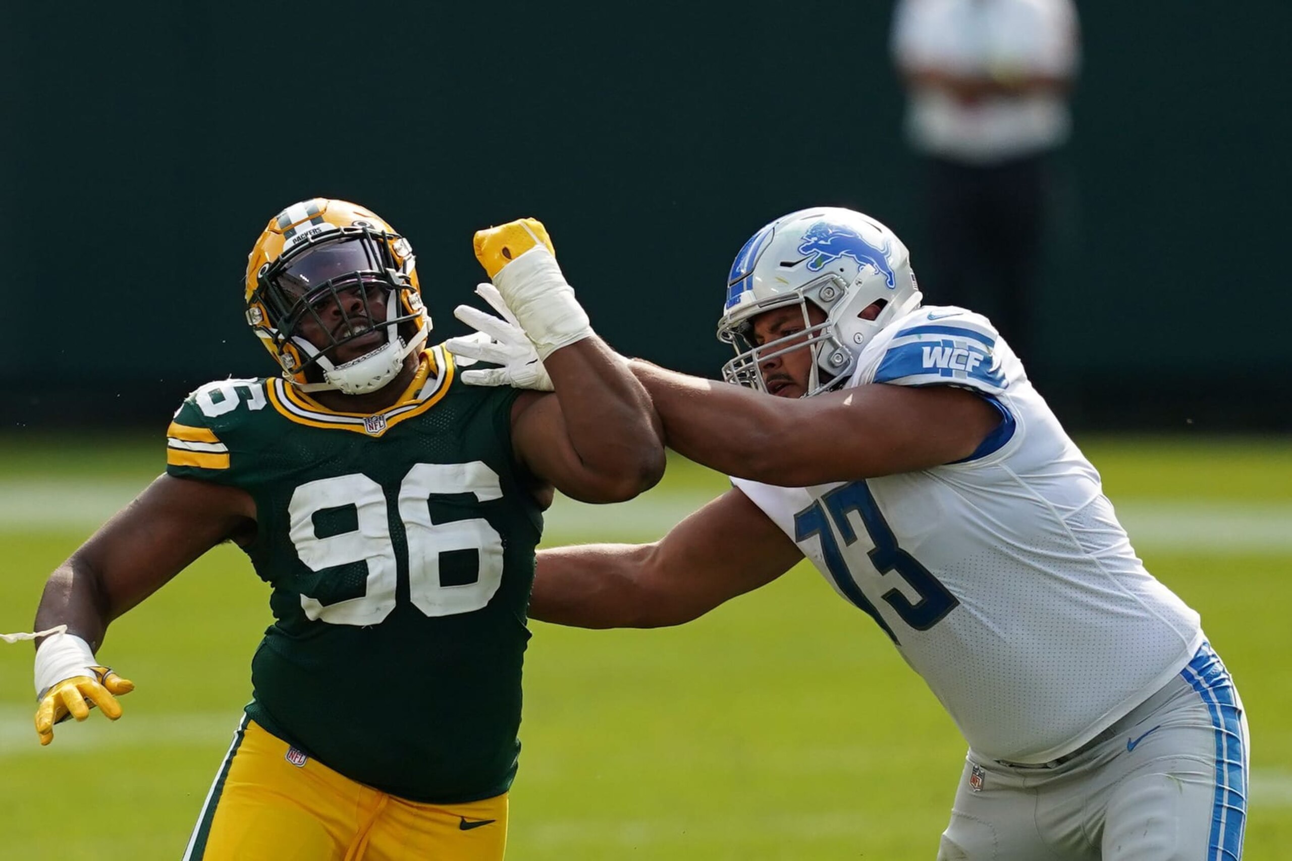 GREEN BAY, WISCONSIN - SEPTEMBER 20:  Kingsley Keke #96 of the Green Bay Packers works against Jonah Jackson #73 of the Detroit Lions during a game at Lambeau Field on September 20, 2020 in Green Bay, Wisconsin. The Packers defeated the Lions 42-21. (Photo by Stacy Revere/Getty Images)