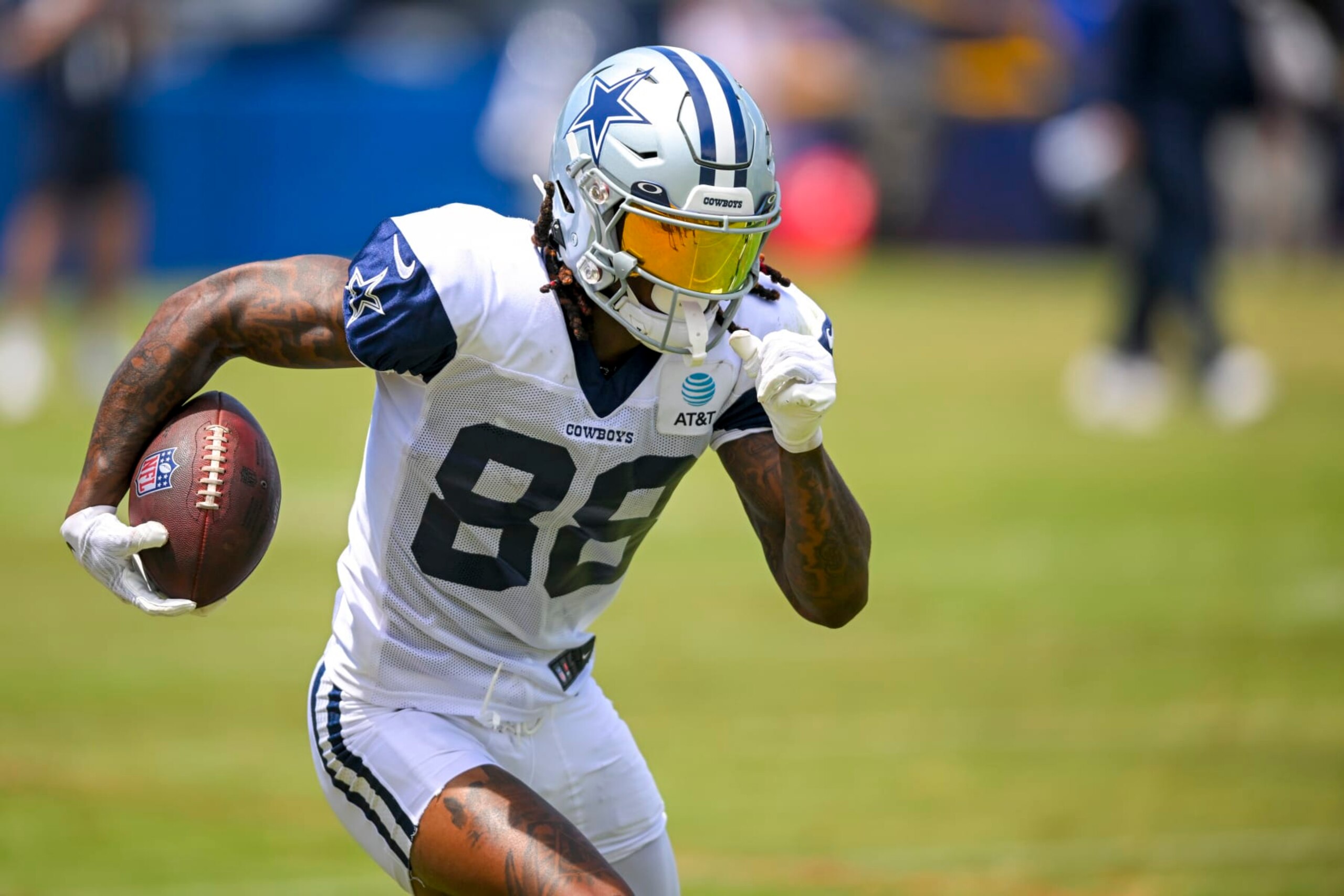 FILE - Dallas Cowboys wide receiver CeeDee Lamb runs with the ball after making a reception during NFL football training camp, Monday, Aug. 1, 2022, in Oxnard, Calif. Lamb is ready to be the No. 1 receiver for the Cowboys. (AP Photo/Gus Ruelas, File)