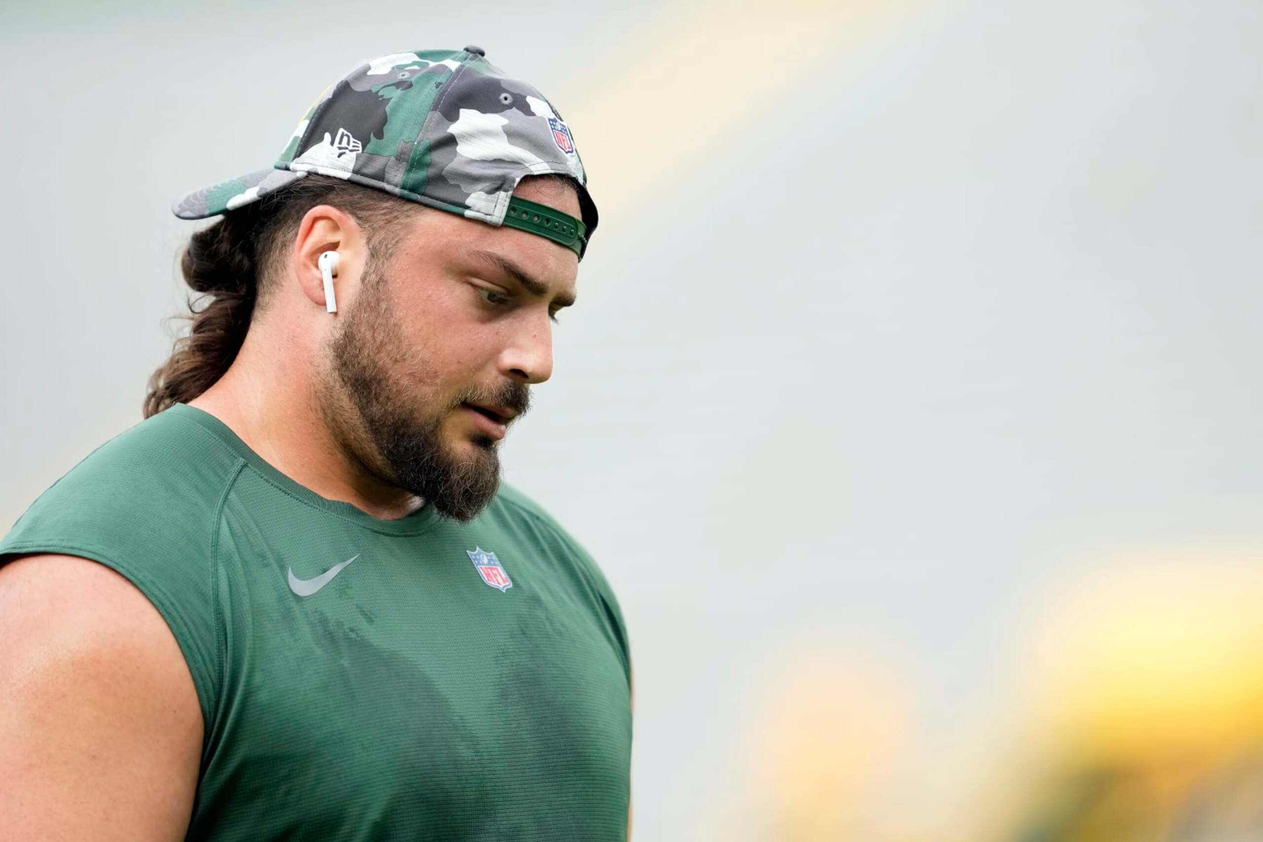 GREEN BAY, WISCONSIN - AUGUST 19: David Bakhtiari #69 of the Green Bay Packers warms up before a preseason game against the New Orleans Saints at Lambeau Field on August 19, 2022 in Green Bay, Wisconsin. (Photo by Patrick McDermott/Getty Images)