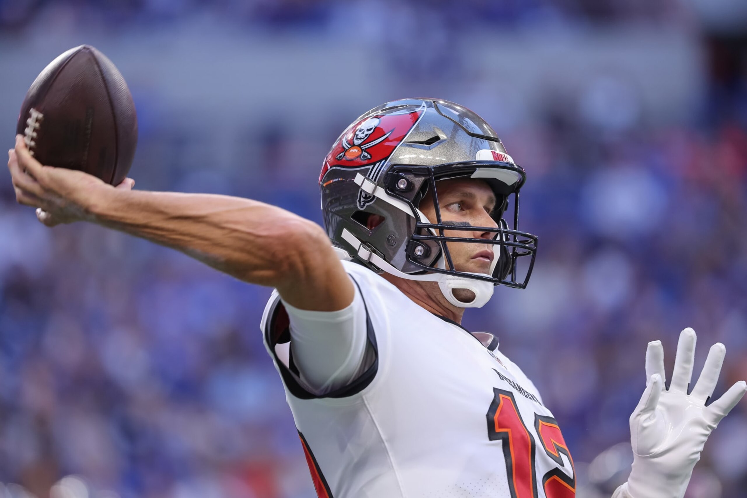 INDIANAPOLIS, IN - AUGUST 27: Tom Brady #12 of Tampa Bay Buccaneers throws the ball during an injury timeout during the preseason game against the Indianapolis Colts at Lucas Oil Stadium on August 27, 2022 in Indianapolis, Indiana. (Photo by Michael Hickey/Getty Images) INDIANAPOLIS, IN - AUGUST 27: Tom Brady #12 of Tampa Bay Buccaneers throws the ball during an injury timeout during the preseason game against the Indianapolis Colts at Lucas Oil Stadium on August 27, 2022 in Indianapolis, Indiana. (Photo by Michael Hickey/Getty Images)