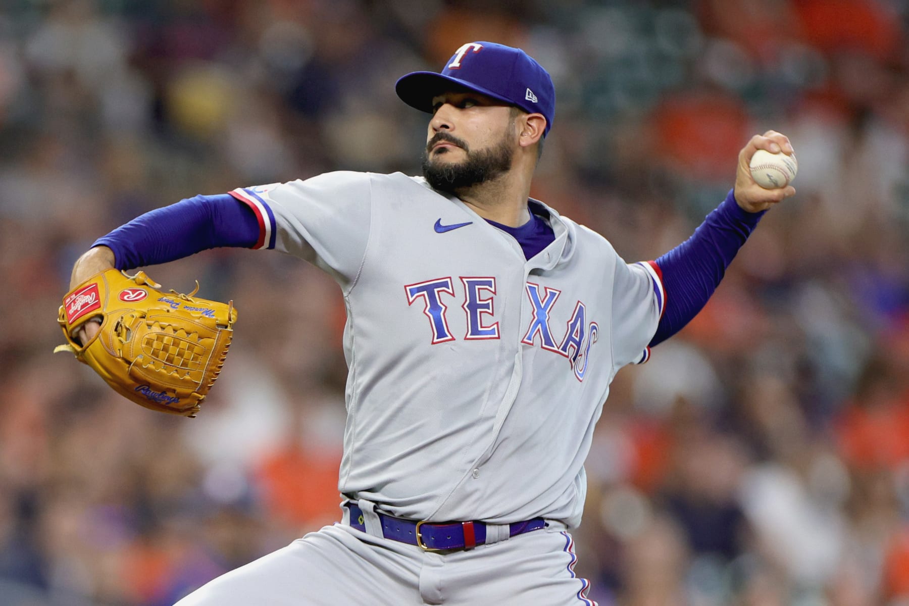 HOUSTON, TEXAS - SEPTEMBER 05: Martin Perez #54 of the Texas Rangers delivers during the second inning against the Houston Astros at Minute Maid Park on September 05, 2022 in Houston, Texas. (Photo by Carmen Mandato/Getty Images)