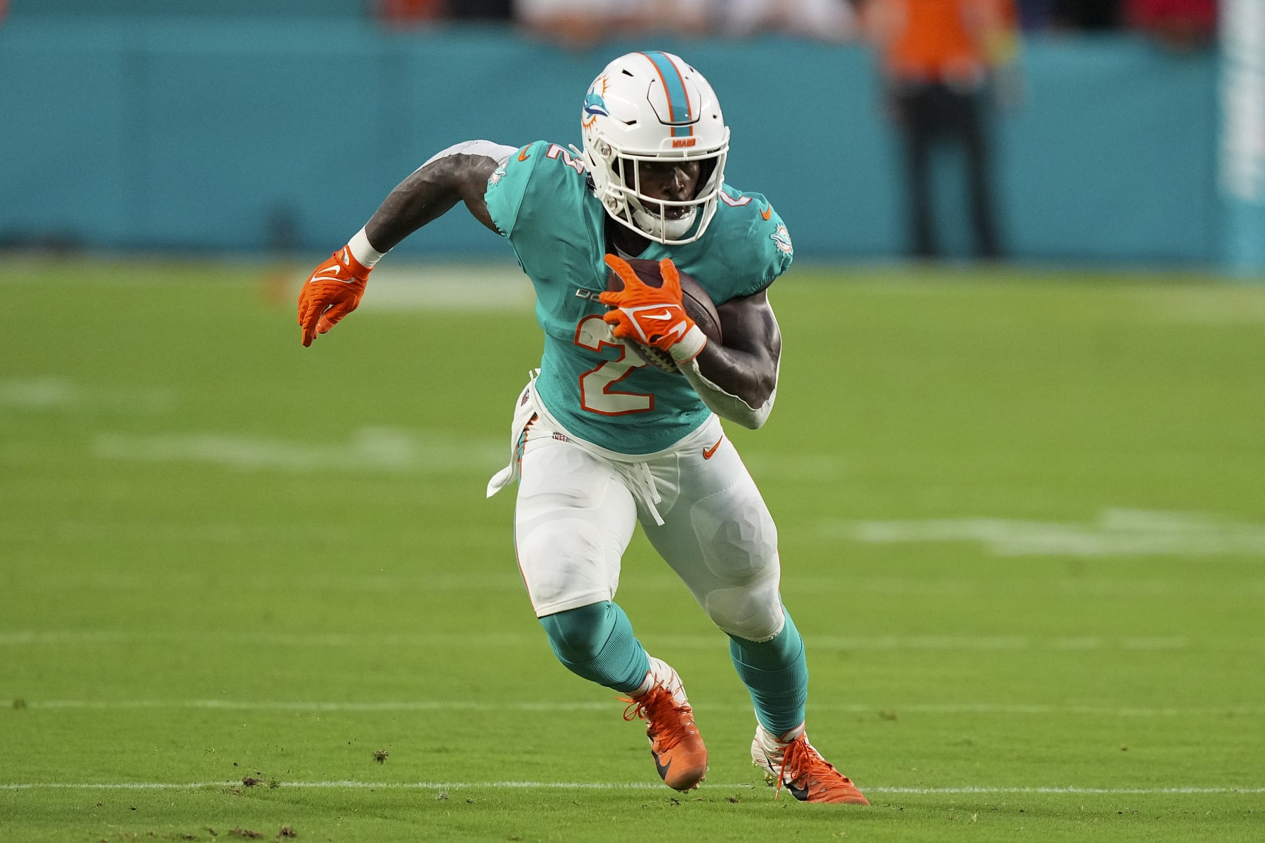 MIAMI GARDENS, FLORIDA - AUGUST 20: Chase Edmonds #2 of the Miami Dolphins runs upfield during the second quarter against the Las Vegas Raiders at Hard Rock Stadium on August 20, 2022 in Miami Gardens, Florida. (Photo by Eric Espada/Getty Images)