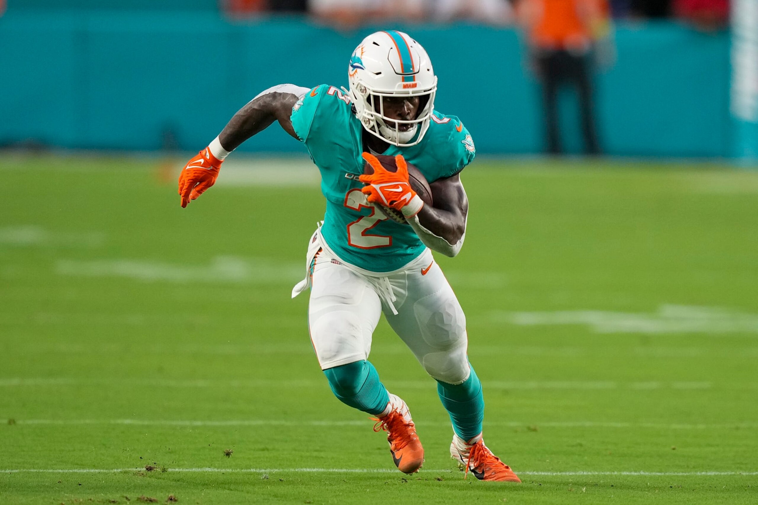 MIAMI GARDENS, FLORIDA - AUGUST 20: Chase Edmonds #2 of the Miami Dolphins runs upfield during the second quarter against the Las Vegas Raiders at Hard Rock Stadium on August 20, 2022 in Miami Gardens, Florida. (Photo by Eric Espada/Getty Images)