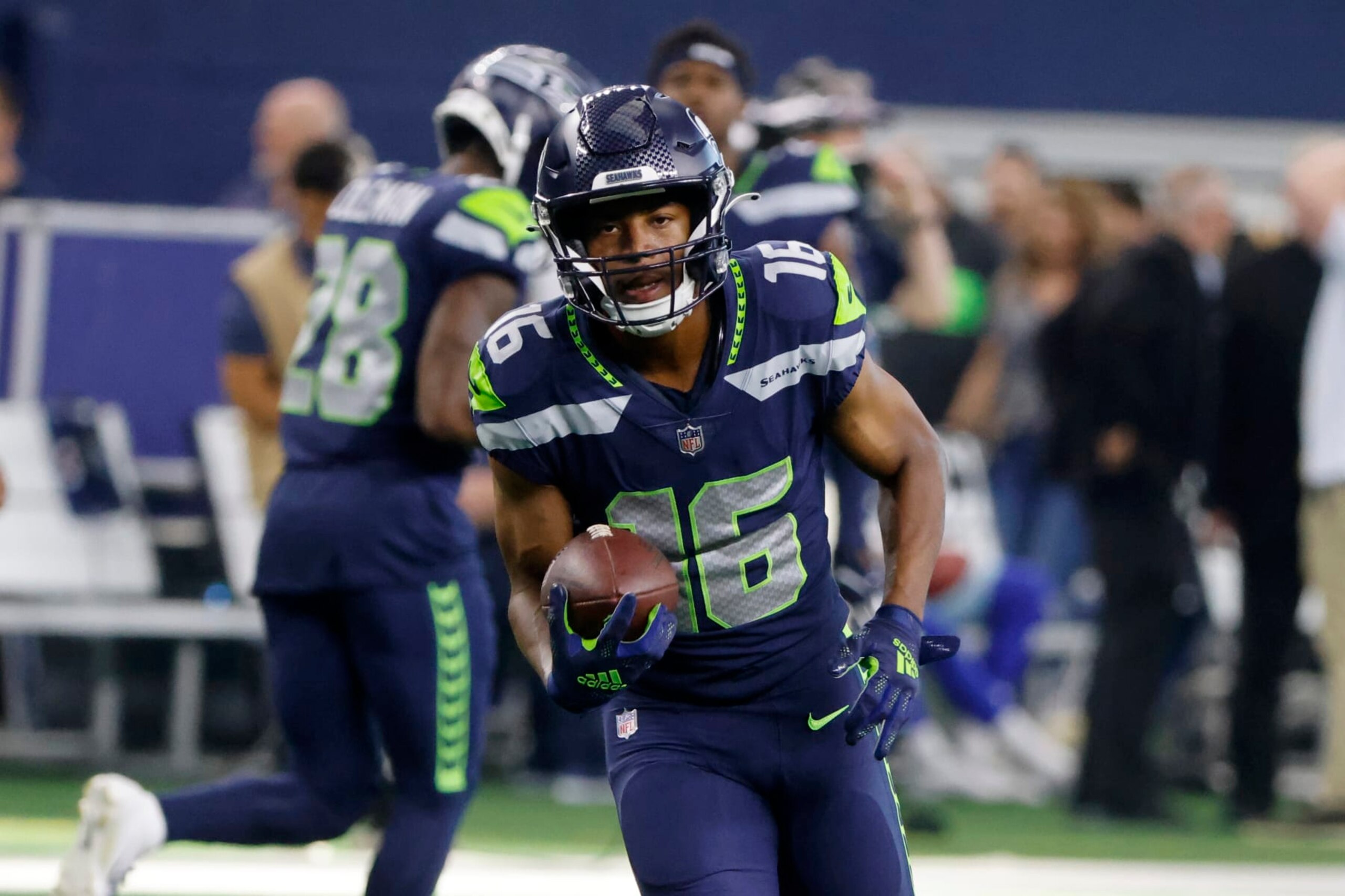 Seattle Seahawks wide receiver Tyler Lockett (16) warms up prior to a preseason NFL Football game in Arlington, Texas, Friday, Aug. 27, 2022. (AP Photo/Michael Ainsworth)