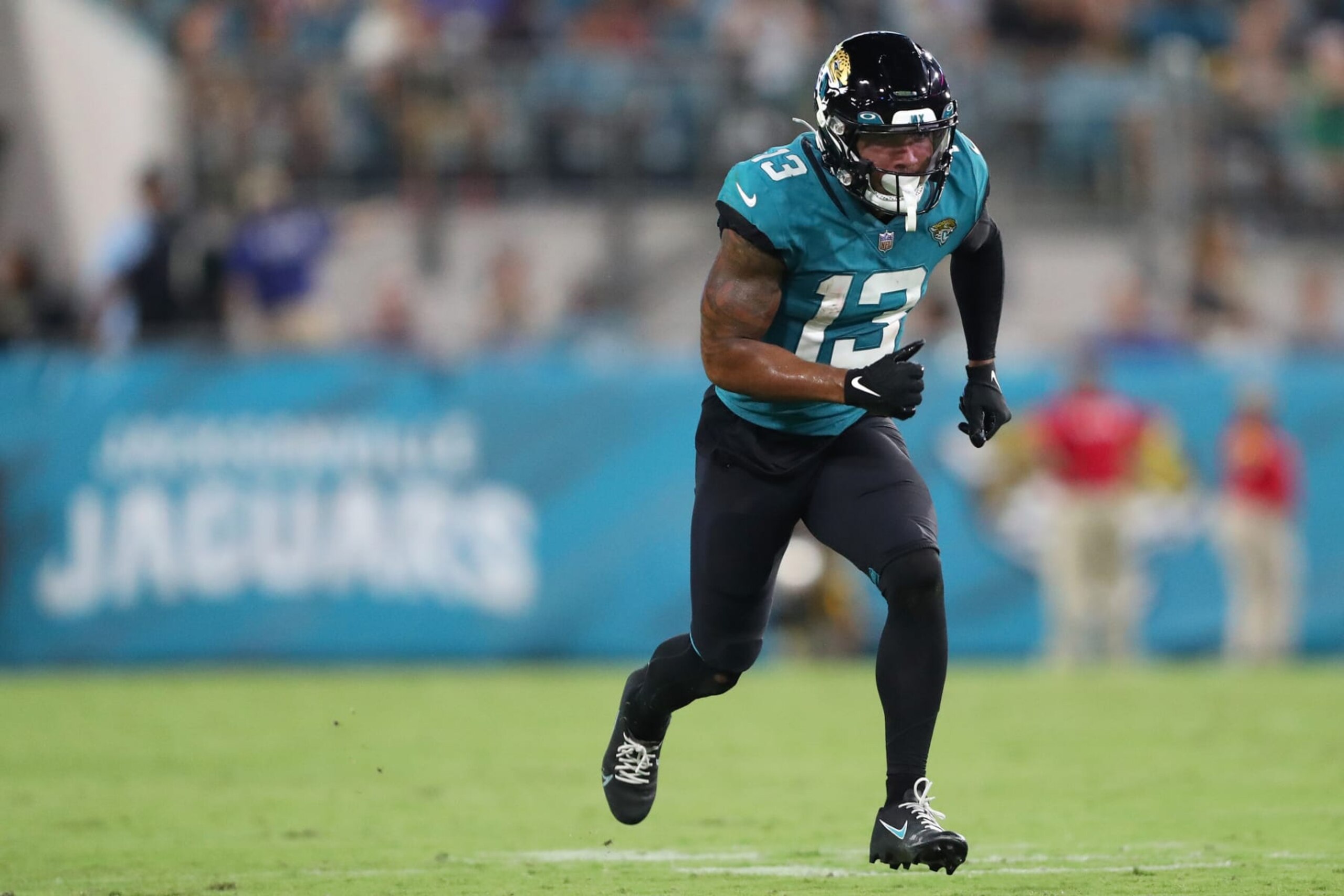 JACKSONVILLE, FLORIDA - AUGUST 20: Christian Kirk #13 of the Jacksonville Jaguars runs in the second half against the Pittsburgh Steelers at TIAA Bank Field on August 20, 2022 in Jacksonville, Florida. (Photo by Courtney Culbreath/Getty Images)