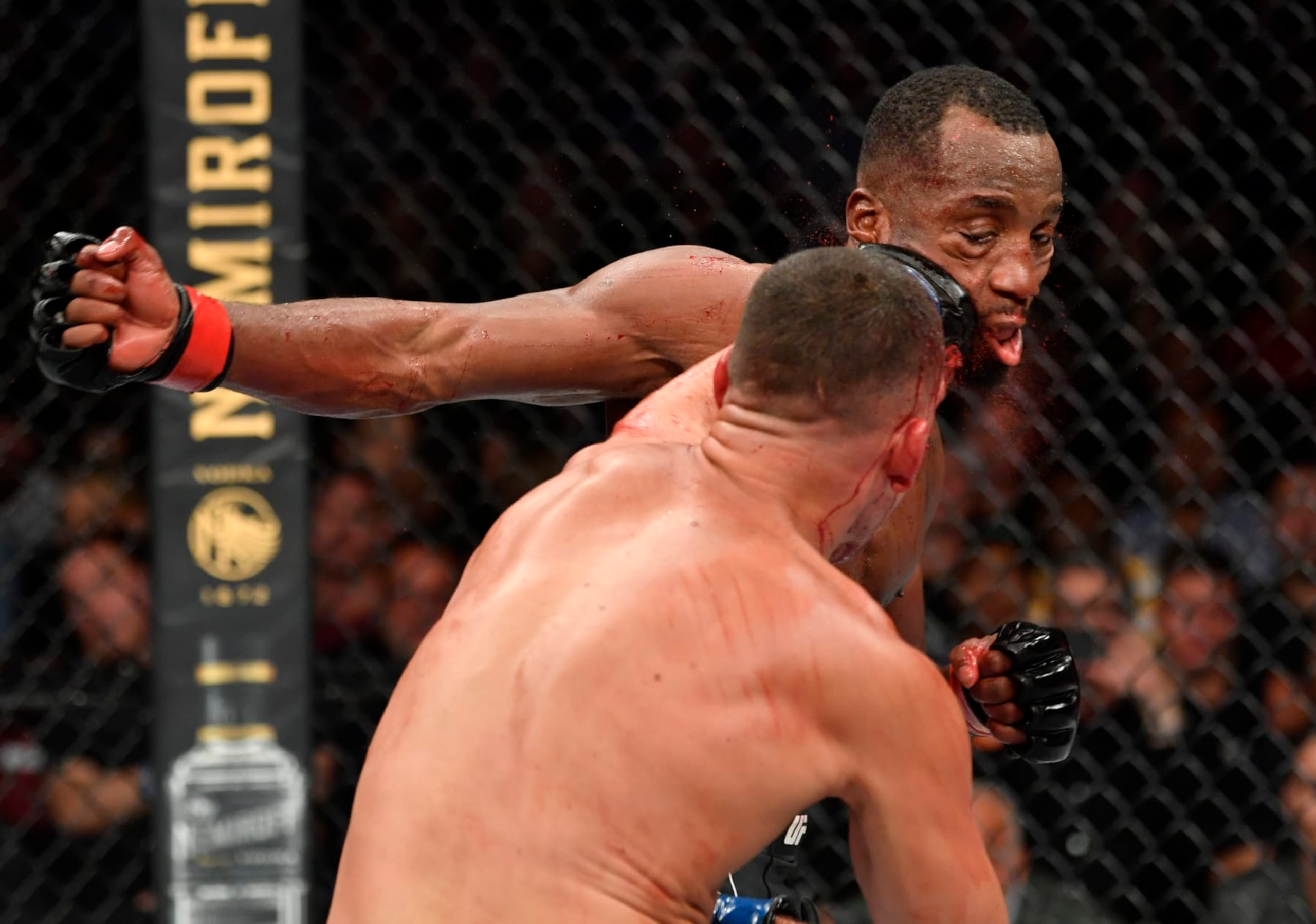 GLENDALE, ARIZONA - JUNE 12: (L-R) Nate Diaz punches Leon Edwards of Jamaica in their welterweight fight during the UFC 263 event at Gila River Arena on June 12, 2021 in Glendale, Arizona. (Photo by Jeff Bottari/Zuffa LLC)