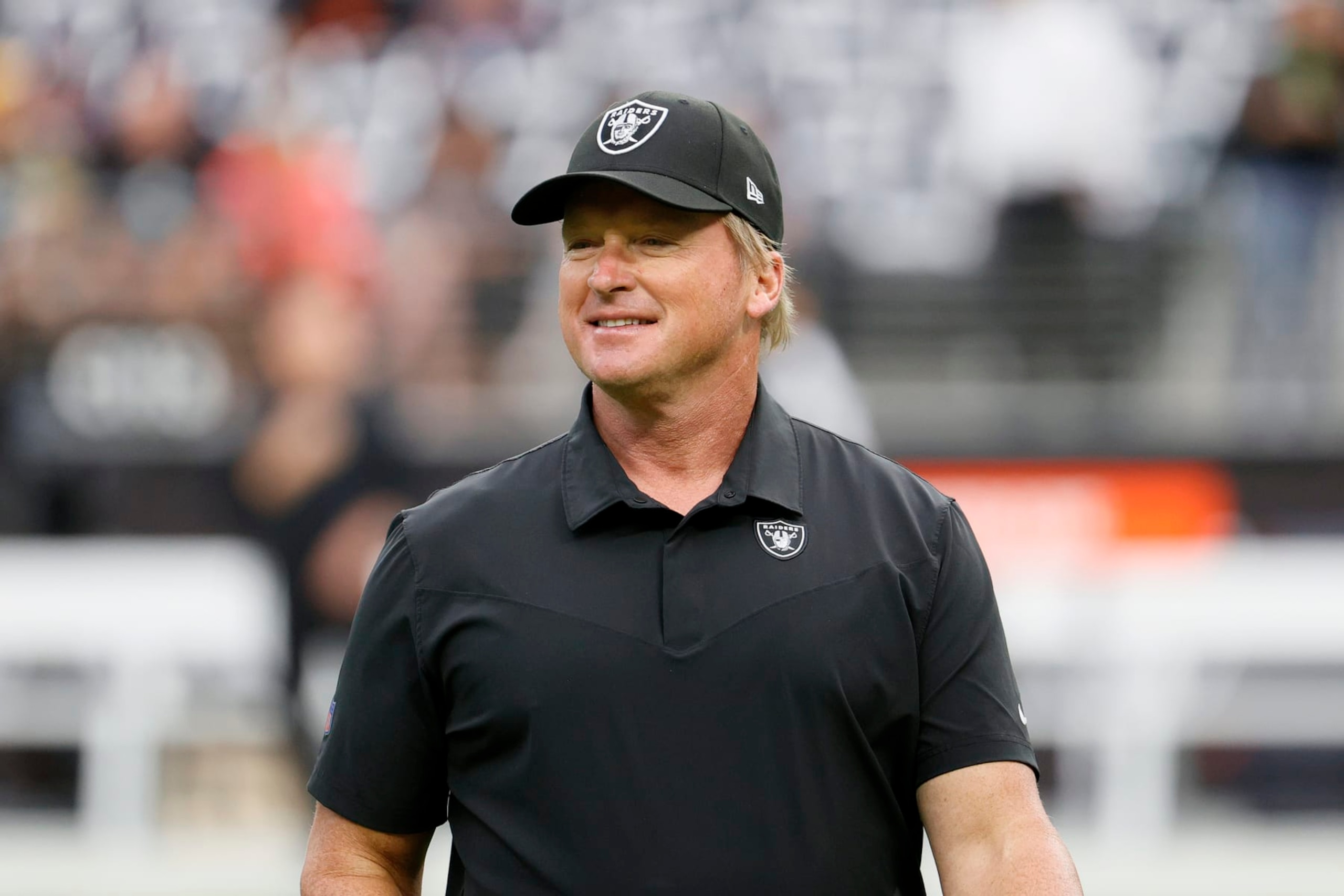 LAS VEGAS, NEVADA - OCTOBER 10: Head coach John Gruden of the Las Vegas Raiders looks on before a game against the Chicago Bears at Allegiant Stadium on October 10, 2021 in Las Vegas, Nevada. (Photo by Ethan Miller/Getty Images)