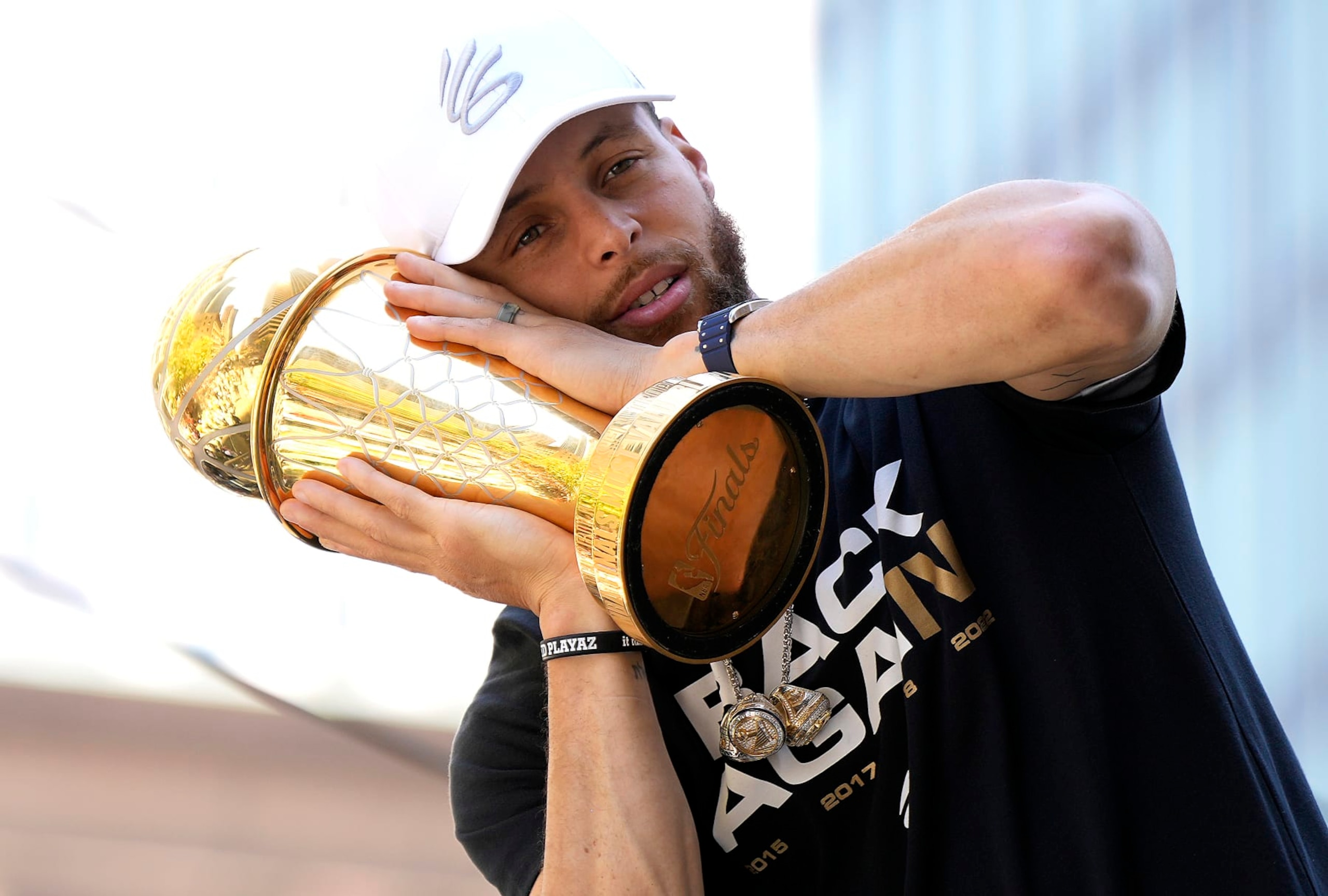 SAN FRANCISCO, CALIFORNIA - JUNE 20: Stephen Curry #30 of the Golden State Warriors celebrates with his NBA Finals Most Valuable Player Award during the Golden State Warriors Victory Parade on June 20, 2022 in San Francisco, California. The Golden State Warriors beat the Boston Celtics 4-2 to win the 2022 NBA Finals. NOTE TO USER: User expressly acknowledges and agrees that, by downloading and or using this photograph, User is consenting to the terms and conditions of the Getty Images License Agreement. (Photo by Thearon W. Henderson/Getty Images)(Photo by Thearon W. Henderson/Getty Images)