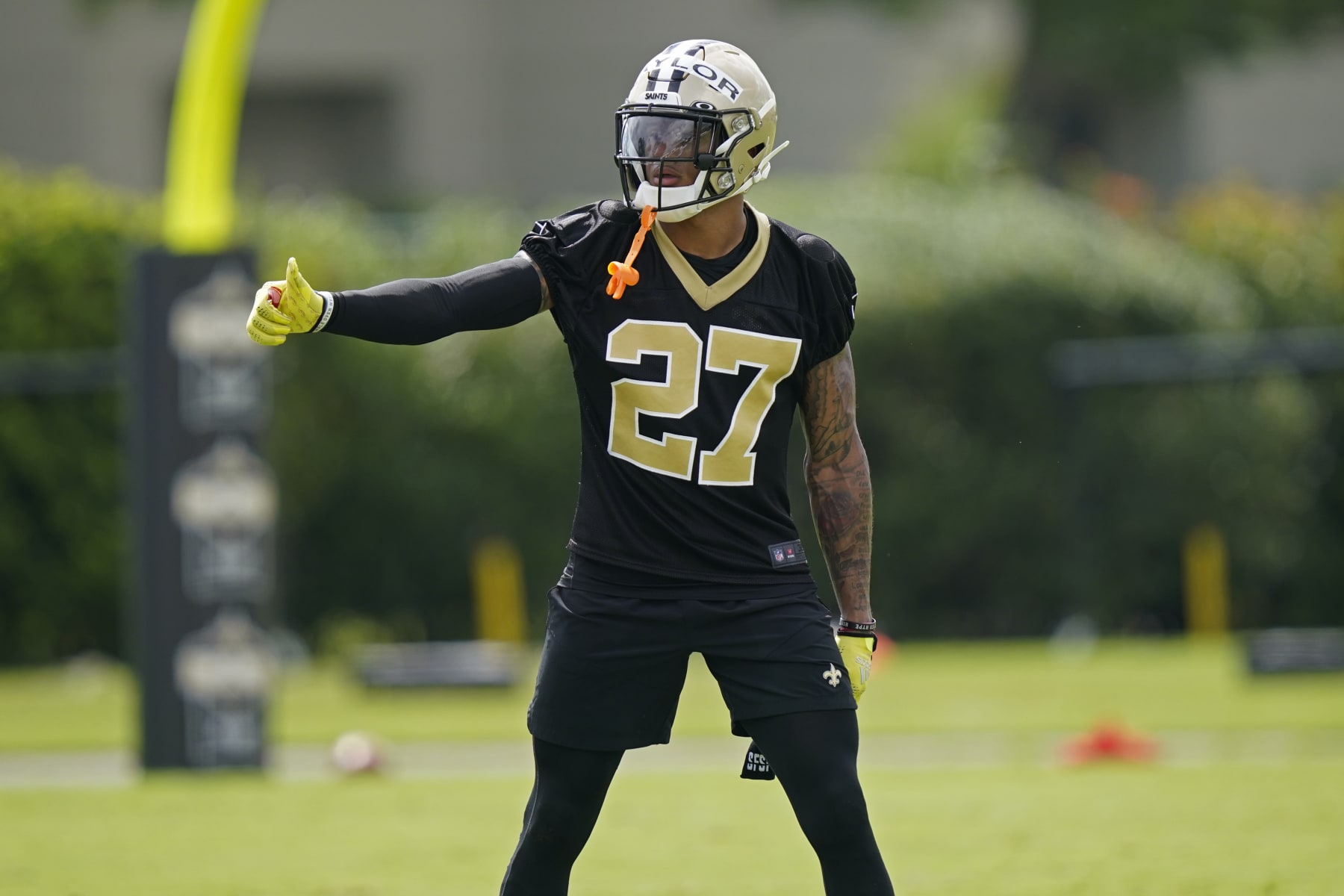 New Orleans Saints cornerback Alontae Taylor (27) participates in drills during training camp at their NFL football training facility in Metairie, La., Thursday, July 28, 2022. (AP Photo/Gerald Herbert)