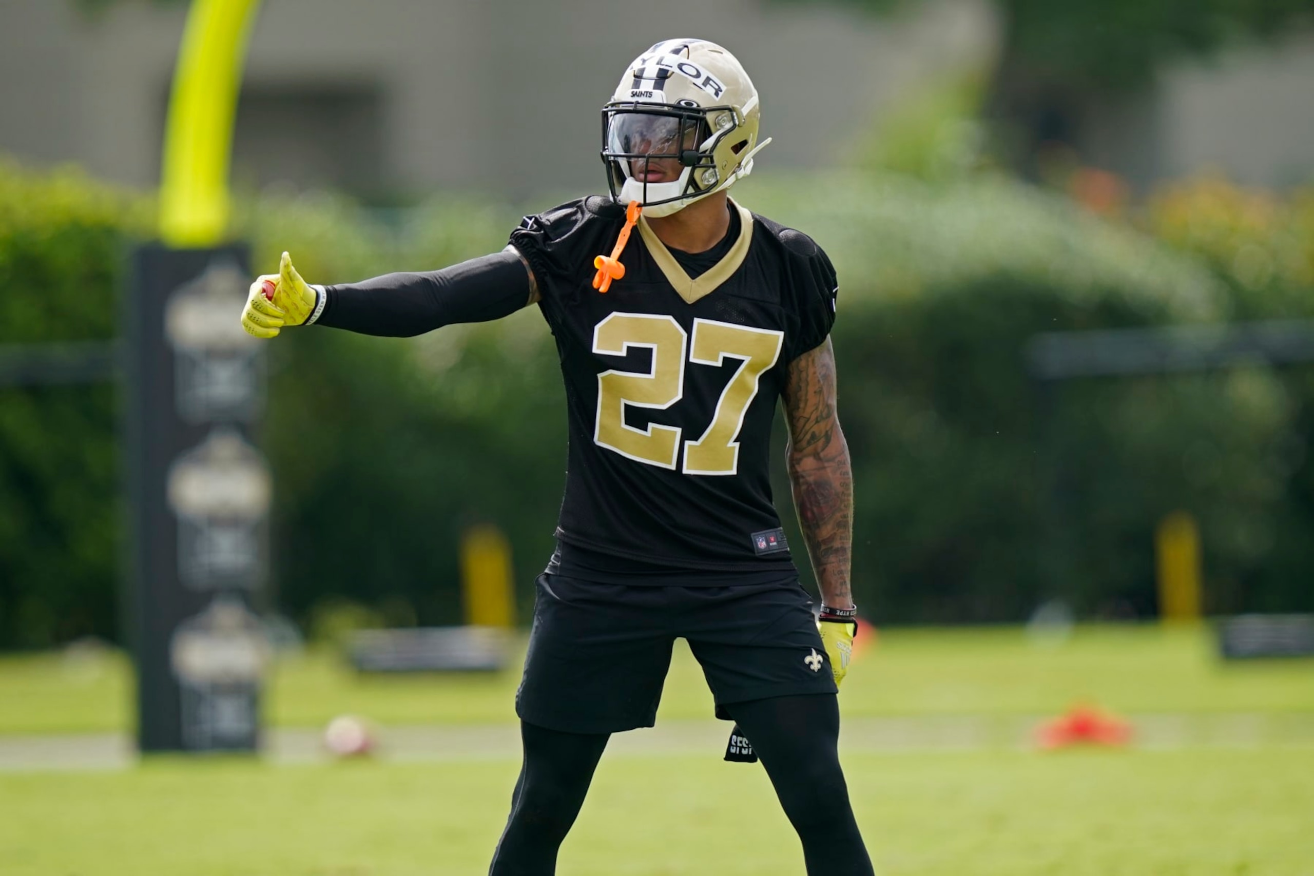 New Orleans Saints cornerback Alontae Taylor (27) participates in drills during training camp at their NFL football training facility in Metairie, La., Thursday, July 28, 2022. (AP Photo/Gerald Herbert)