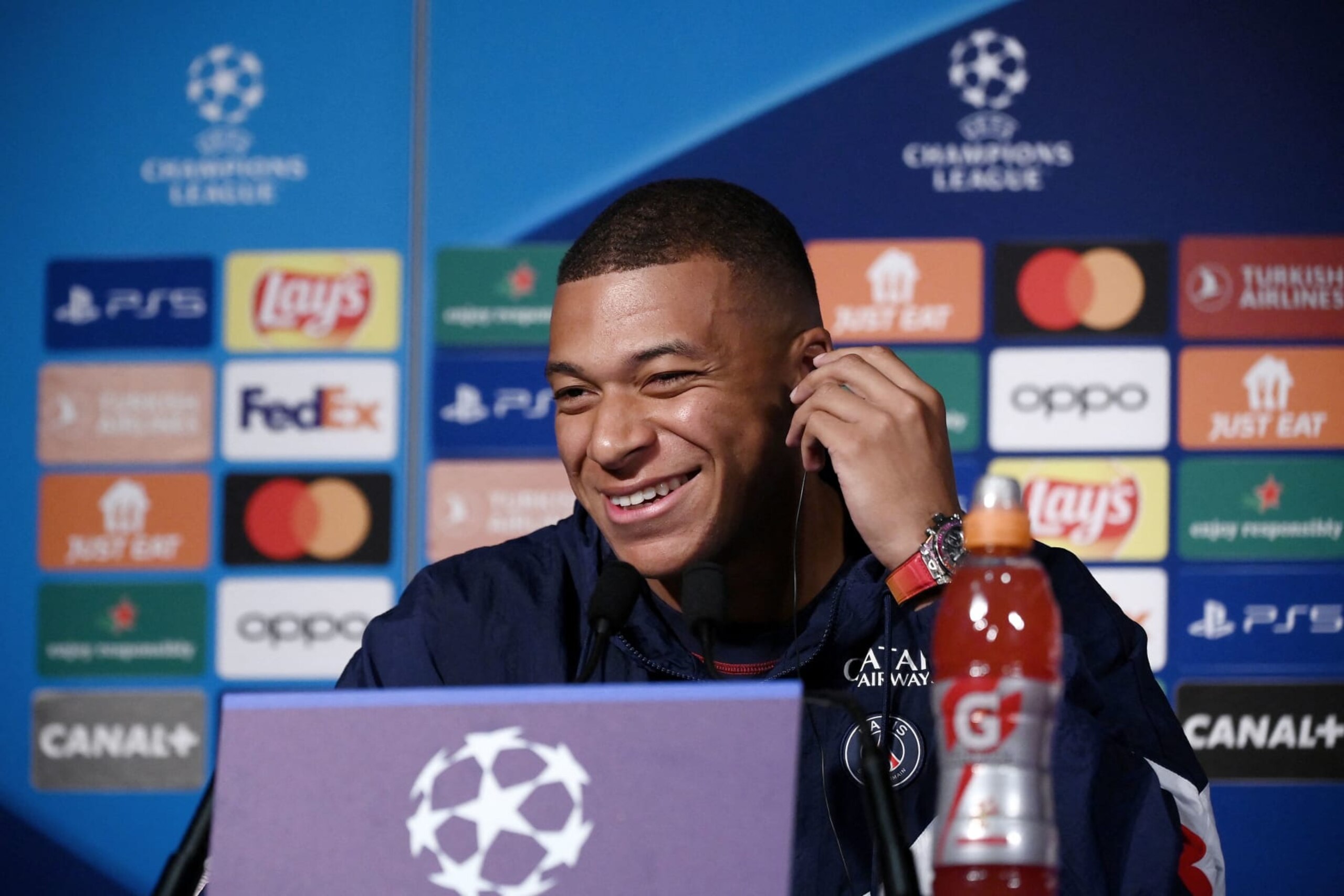 Paris Saint-Germain's French forward Kylian Mbappe smiles during a press conference at the Parc des Princes stadium in Paris on September 5, 2022 on the eve of the UEFA Champions League football match between Paris Saint-Germain and Juventus Turin. (Photo by FRANCK FIFE / AFP) (Photo by FRANCK FIFE/AFP via Getty Images)