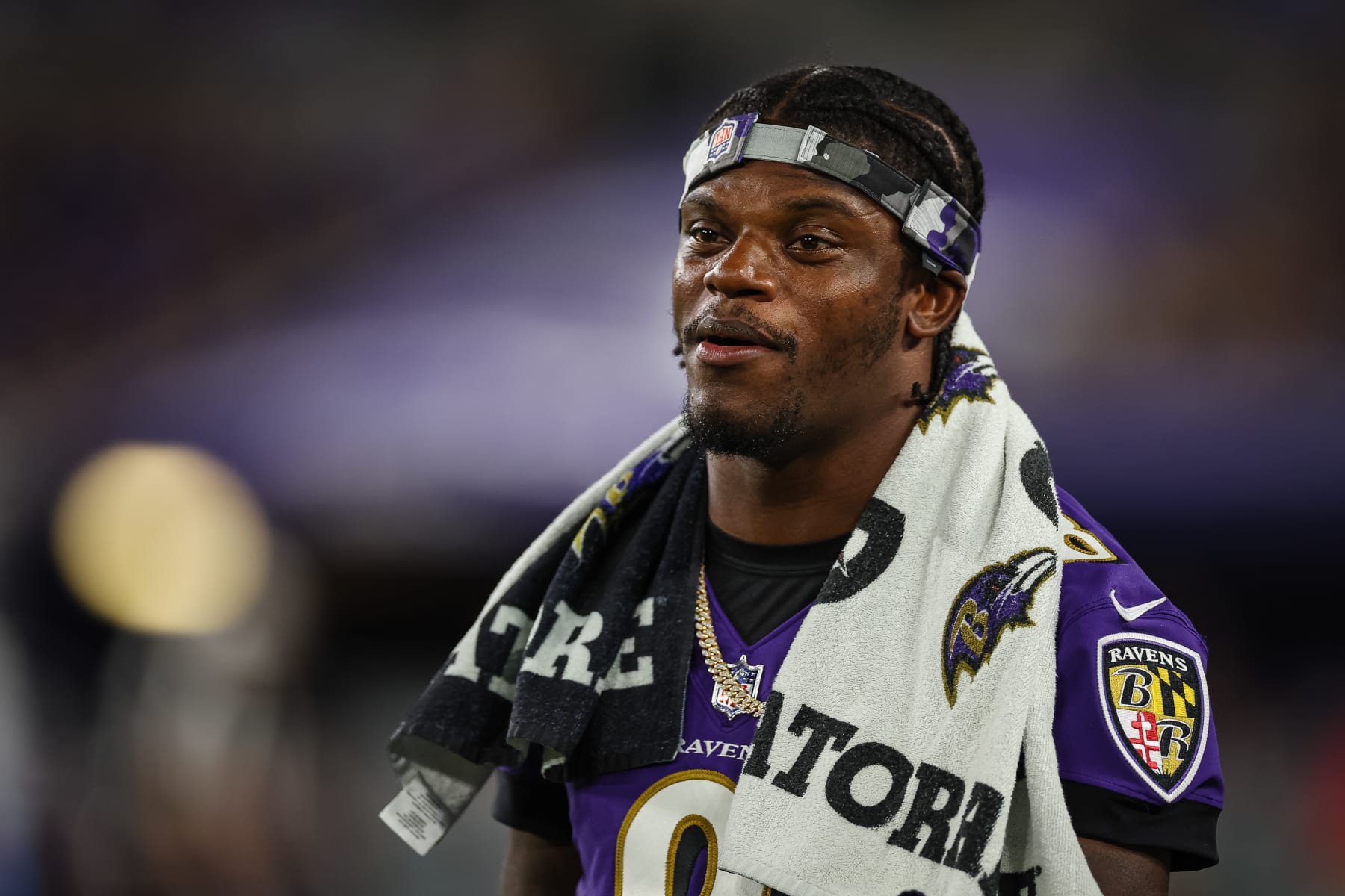 BALTIMORE, MD - AUGUST 11: Lamar Jackson #8 of the Baltimore Ravens looks on against the Tennessee Titans during the second half at M&T Bank Stadium on August 11, 2022 in Baltimore, Maryland. (Photo by Scott Taetsch/Getty Images)