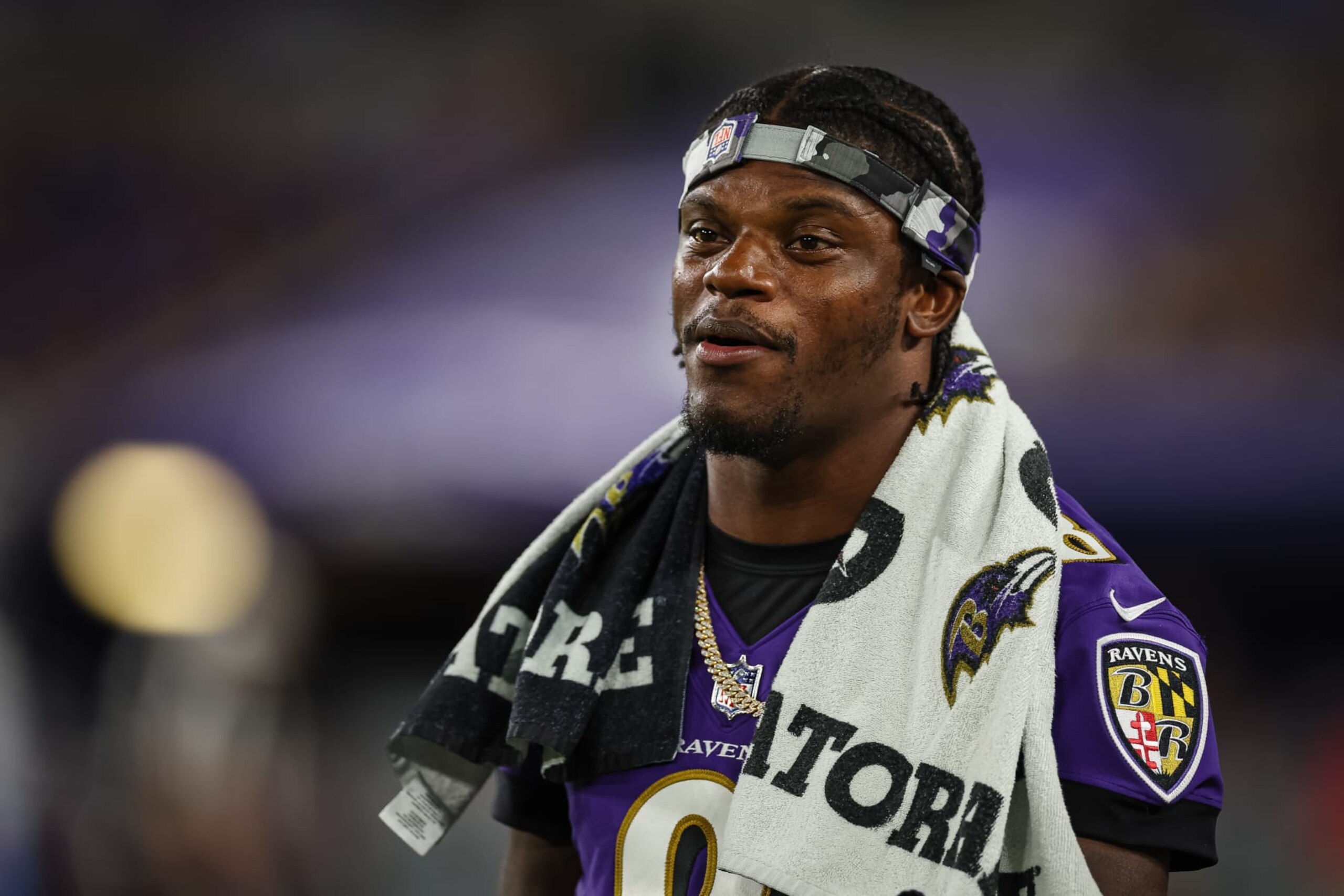 BALTIMORE, MD - AUGUST 11: Lamar Jackson #8 of the Baltimore Ravens looks on against the Tennessee Titans during the second half at M&T Bank Stadium on August 11, 2022 in Baltimore, Maryland. (Photo by Scott Taetsch/Getty Images)