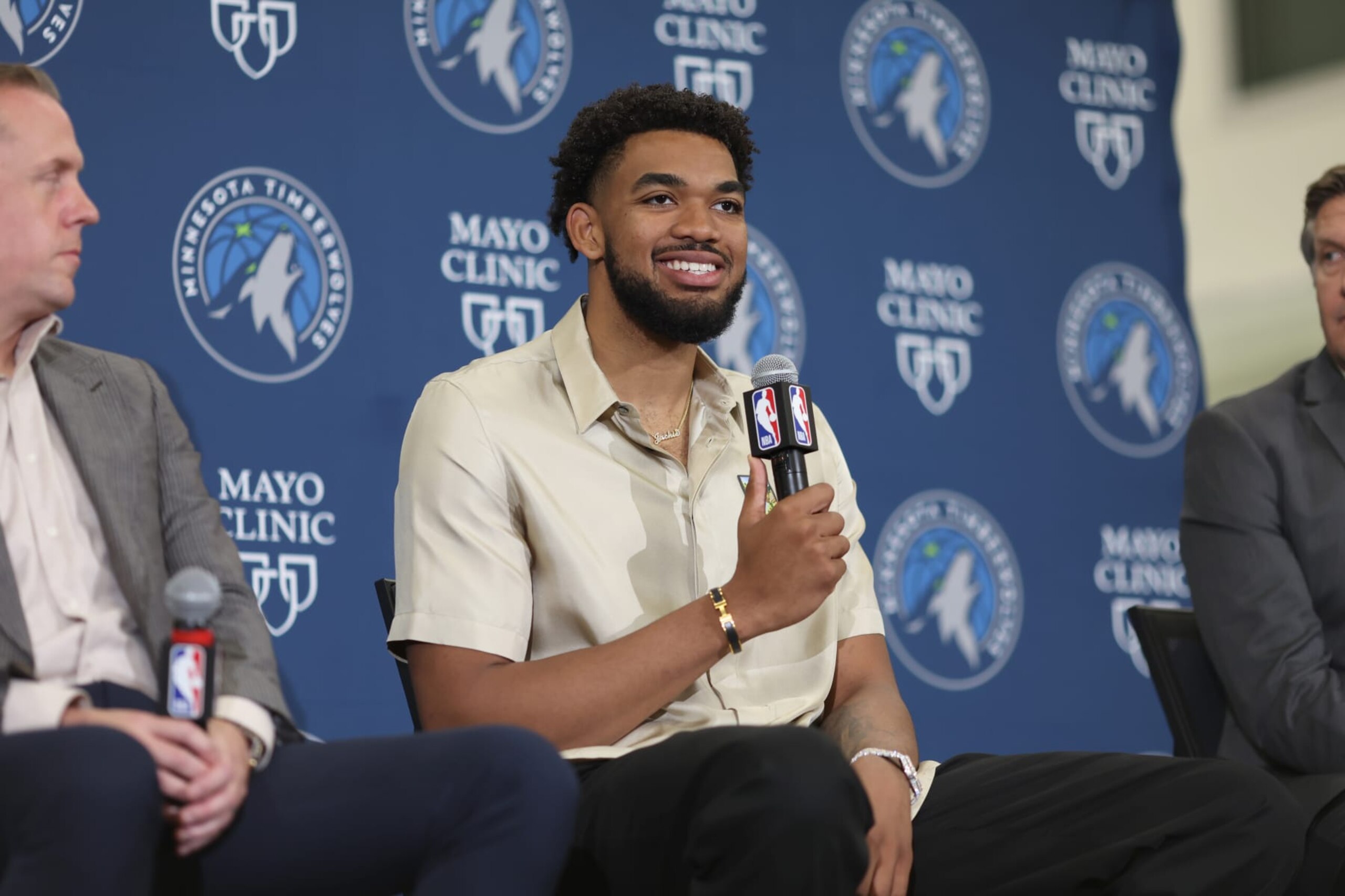 MINNEAPOLIS, MN - JULY 22: Minnesota Timberwolves President of Basketball Operations Tim Connelly, Head Coach Chris Finch and forward/center Karl-Anthony Towns meet with the media to discuss the announcement of the contract extension for Towns on July 22, 2022 at the Minnesota Timberwolves and Lynx Courts at Mayo Clinic Square in Minneapolis, Minnesota. NOTE TO USER: User expressly acknowledges and agrees that, by downloading and or using this Photograph, user is consenting to the terms and conditions of the Getty Images License Agreement. Mandatory Copyright Notice: Copyright 2022 NBAE (Photo by David Sherman/NBAE via Getty Images) MINNEAPOLIS, MN - JULY 22: Minnesota Timberwolves President of Basketball Operations Tim Connelly, Head Coach Chris Finch and forward/center Karl-Anthony Towns meet with the media to discuss the announcement of the contract extension for Towns on July 22, 2022 at the Minnesota Timberwolves and Lynx Courts at Mayo Clinic Square in Minneapolis, Minnesota. NOTE TO USER: User expressly acknowledges and agrees that, by downloading and or using this Photograph, user is consenting to the terms and conditions of the Getty Images License Agreement. Mandatory Copyright Notice: Copyright 2022 NBAE (Photo by David Sherman/NBAE via Getty Images)