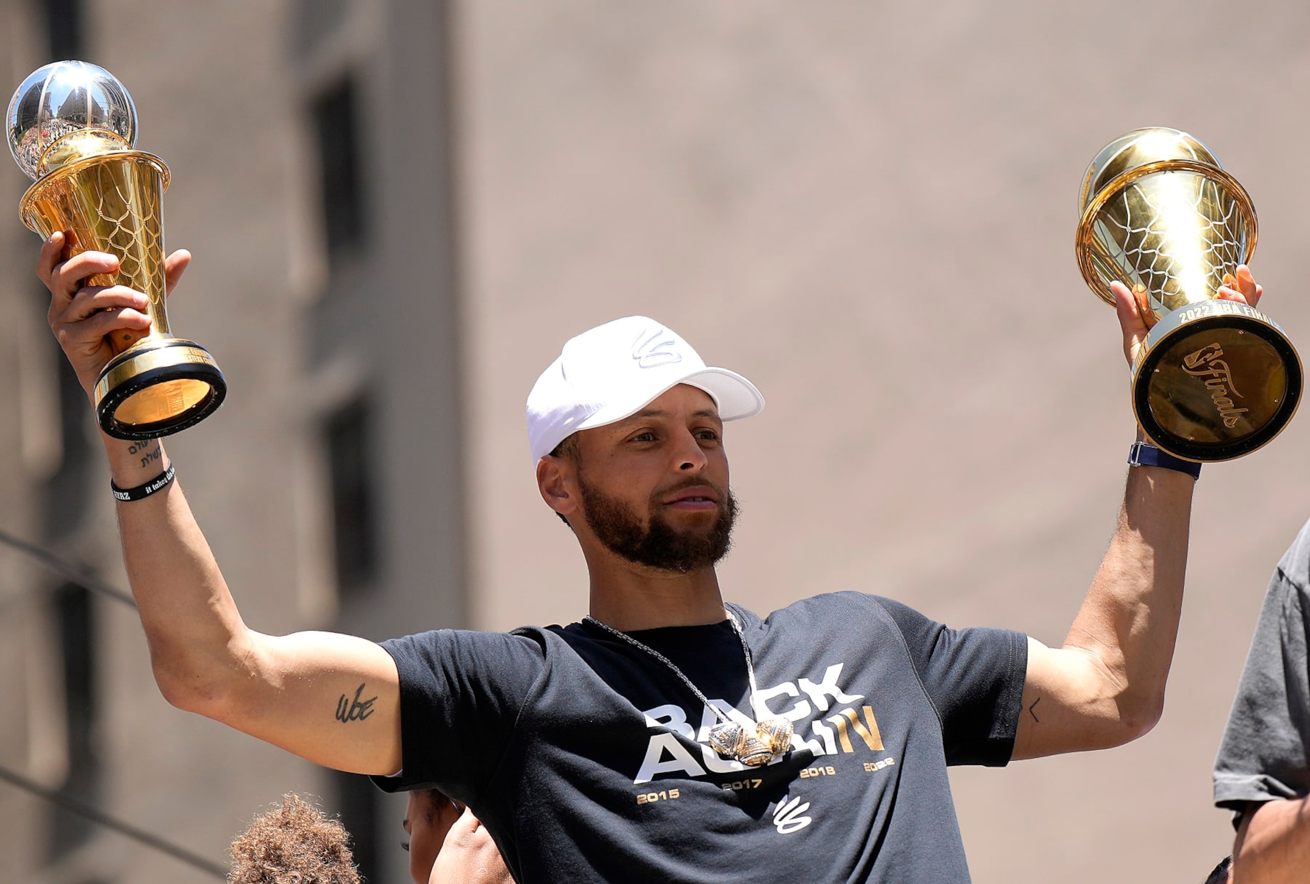 SAN FRANCISCO, CALIFORNIA - JUNE 20: Stephen Curry #30 of the Golden State Warriors celebrates with his NBA Finals Most Valuable Player Award during the Golden State Warriors Victory Parade on June 20, 2022 in San Francisco, California. The Golden State Warriors beat the Boston Celtics 4-2 to win the 2022 NBA Finals. NOTE TO USER: User expressly acknowledges and agrees that, by downloading and or using this photograph, User is consenting to the terms and conditions of the Getty Images License Agreement. (Photo by Thearon W. Henderson/Getty Images)(Photo by Thearon W. Henderson/Getty Images) SAN FRANCISCO, CALIFORNIA - JUNE 20: Stephen Curry #30 of the Golden State Warriors celebrates with his NBA Finals Most Valuable Player Award during the Golden State Warriors Victory Parade on June 20, 2022 in San Francisco, California. The Golden State Warriors beat the Boston Celtics 4-2 to win the 2022 NBA Finals. NOTE TO USER: User expressly acknowledges and agrees that, by downloading and or using this photograph, User is consenting to the terms and conditions of the Getty Images License Agreement. (Photo by Thearon W. Henderson/Getty Images)(Photo by Thearon W. Henderson/Getty Images)