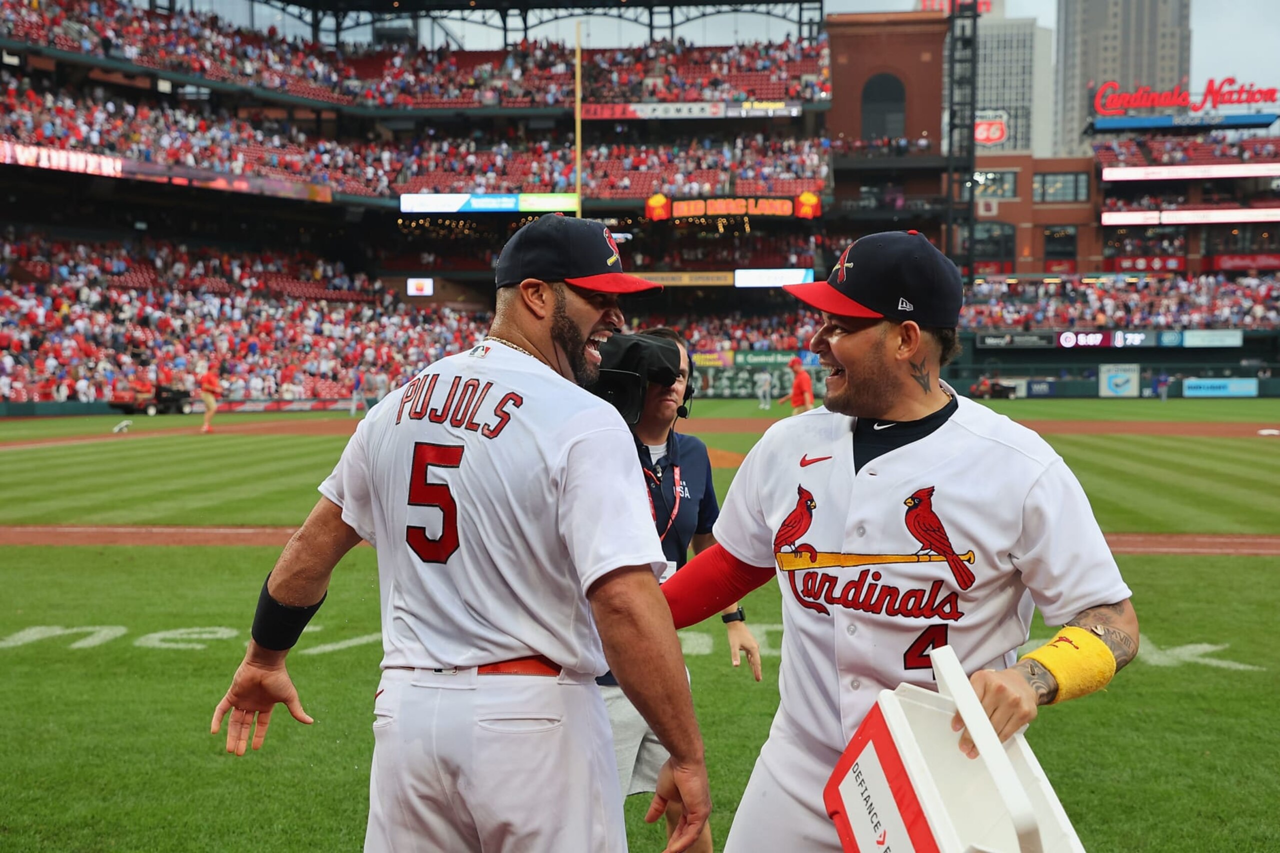 ST LOUIS, MO - SEPTEMBER 04: Albert Pujols #5 of the St. Louis Cardinals celebrates with Yadier Molina #4 of the St. Louis Cardinals after hitting his 695th career home run in a game against the Chicago Cubs at Busch Stadium on September 4, 2022 in St Louis, Missouri. (Photo by Dilip Vishwanat/Getty Images)