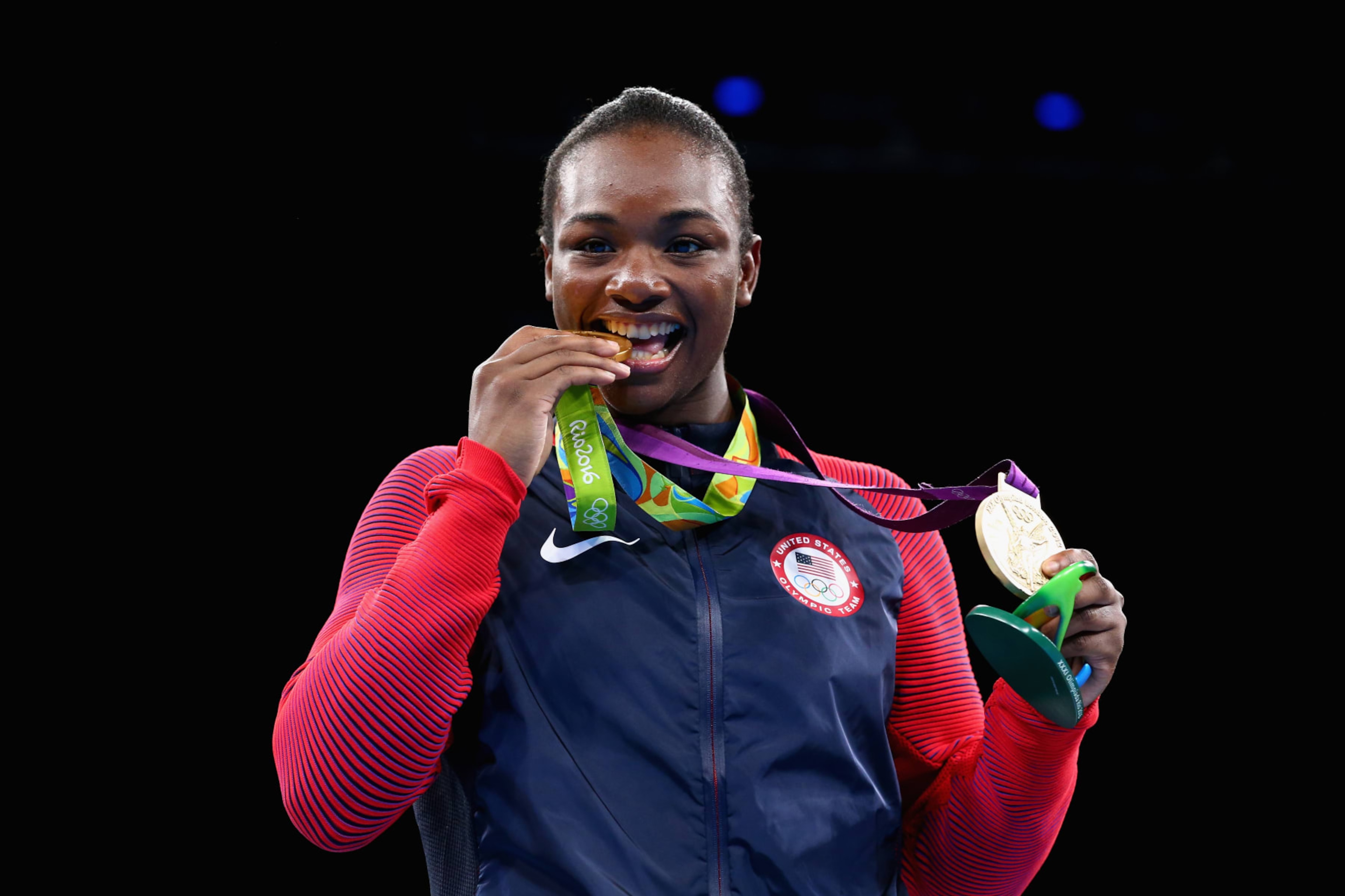 RIO DE JANEIRO, BRAZIL - AUGUST 21: Gold medalist Claressa Maria Shields of the United States poses on the podium during the medal ceremony for the Women's Boxing Middle (69-75kg) on Day 16 of the Rio 2016 Olympic Games at Riocentro - Pavilion 6 on August 21, 2016 in Rio de Janeiro, Brazil. (Photo by Alex Livesey/Getty Images) RIO DE JANEIRO, BRAZIL - AUGUST 21: Gold medalist Claressa Maria Shields of the United States poses on the podium during the medal ceremony for the Women's Boxing Middle (69-75kg) on Day 16 of the Rio 2016 Olympic Games at Riocentro - Pavilion 6 on August 21, 2016 in Rio de Janeiro, Brazil. (Photo by Alex Livesey/Getty Images)