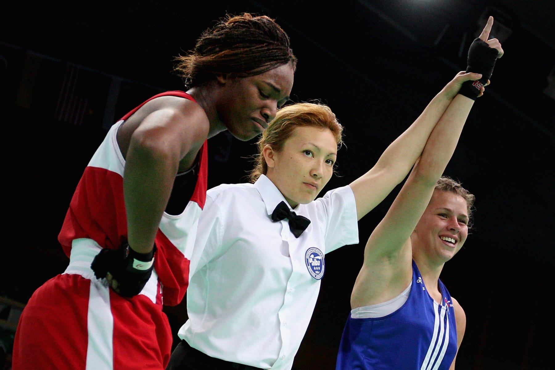 QINHUANGDAO, CHINA - MAY 14:  Savannah Marshall (Blue) of England celebrate winning against Claressa Shields (Red) of the United States in the Women's 75kg preliminary match during the AIBA Women's World Boxing Championships on May 14, 2012 in Qinhuangdao, China. The AIBA Women's World Boxing Championships 2012 which is a London Olympic Games Qualifying Event will be held from May 11 to 19.  (Photo by Feng Li/Getty Images)