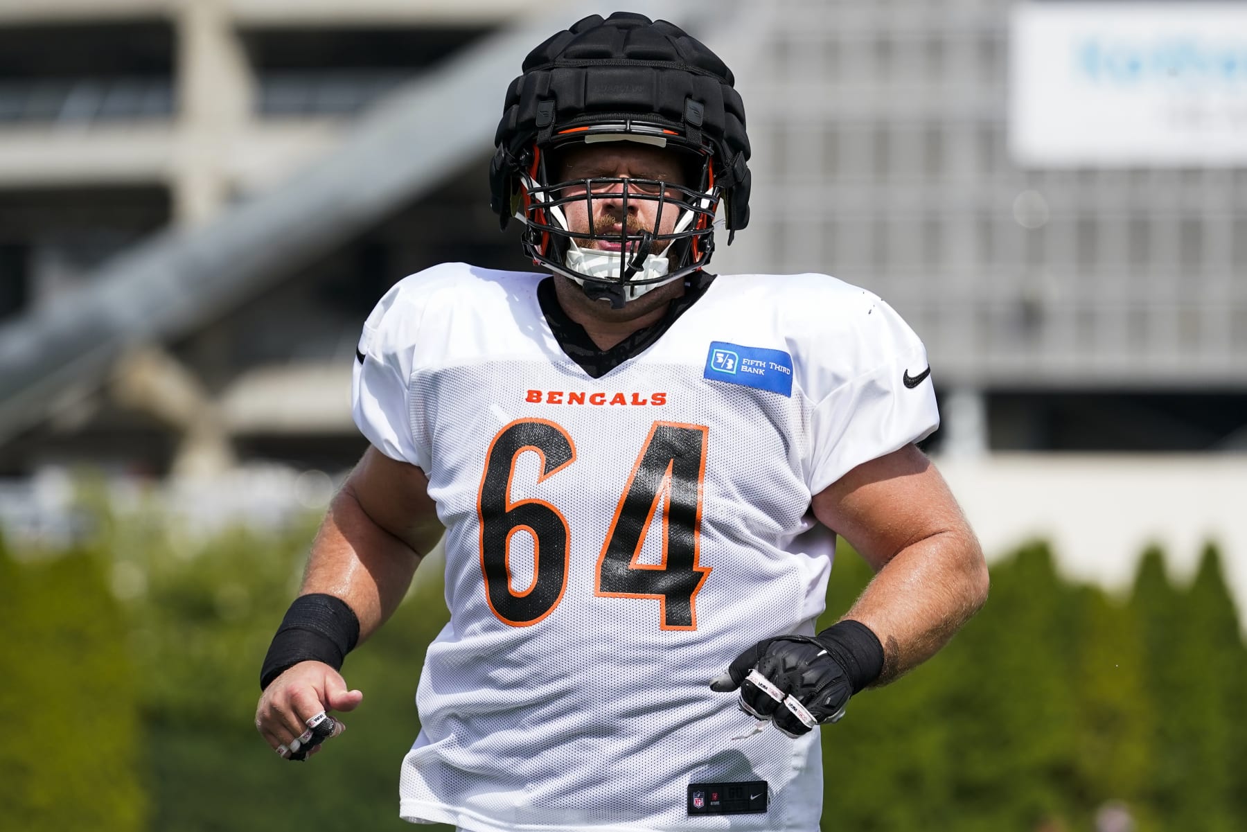 Cincinnati Bengals center Ted Karras (64) participates in drills during practice at the team's NFL football training facility, Wednesday, Aug. 10, 2022, in Cincinnati. (AP Photo/Jeff Dean)