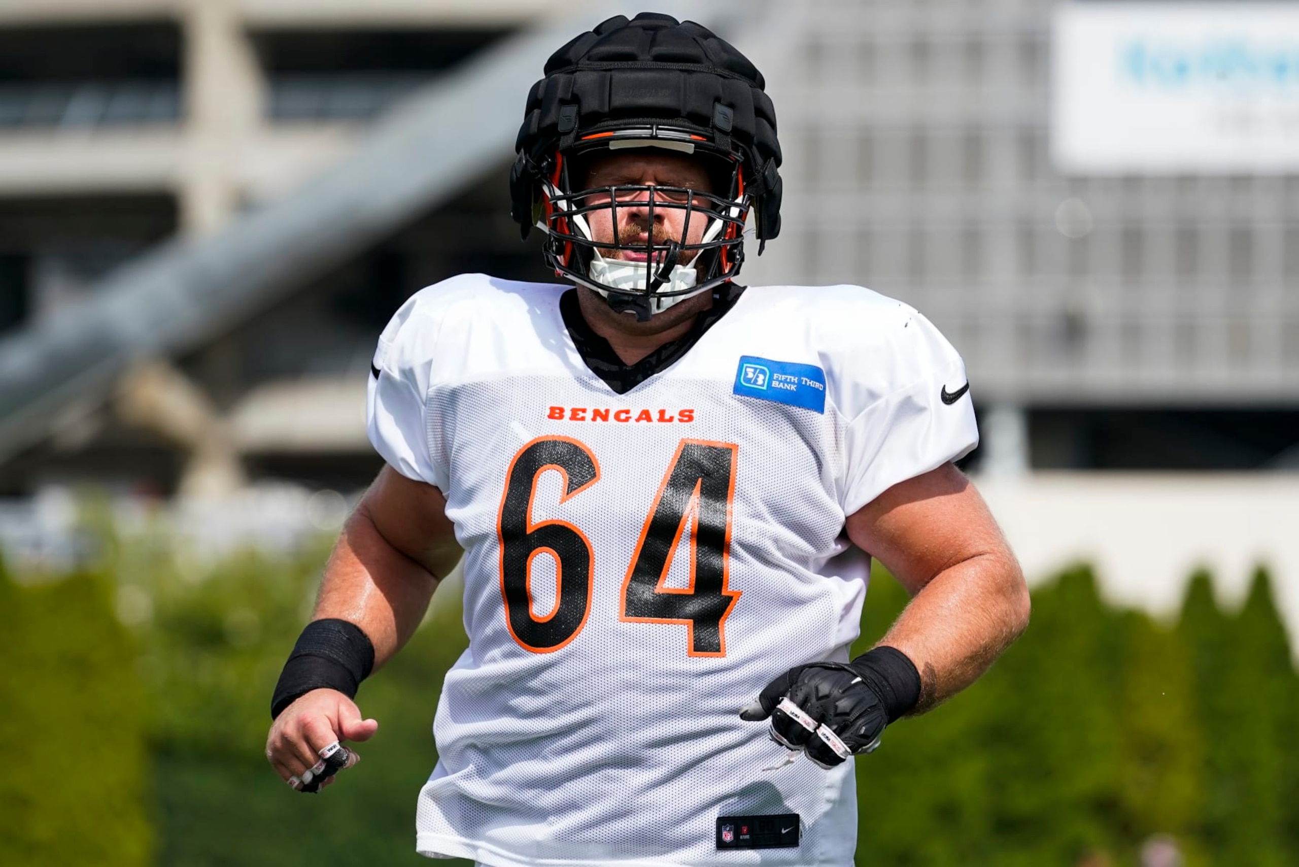 Cincinnati Bengals center Ted Karras (64) participates in drills during practice at the team's NFL football training facility, Wednesday, Aug. 10, 2022, in Cincinnati. (AP Photo/Jeff Dean)
